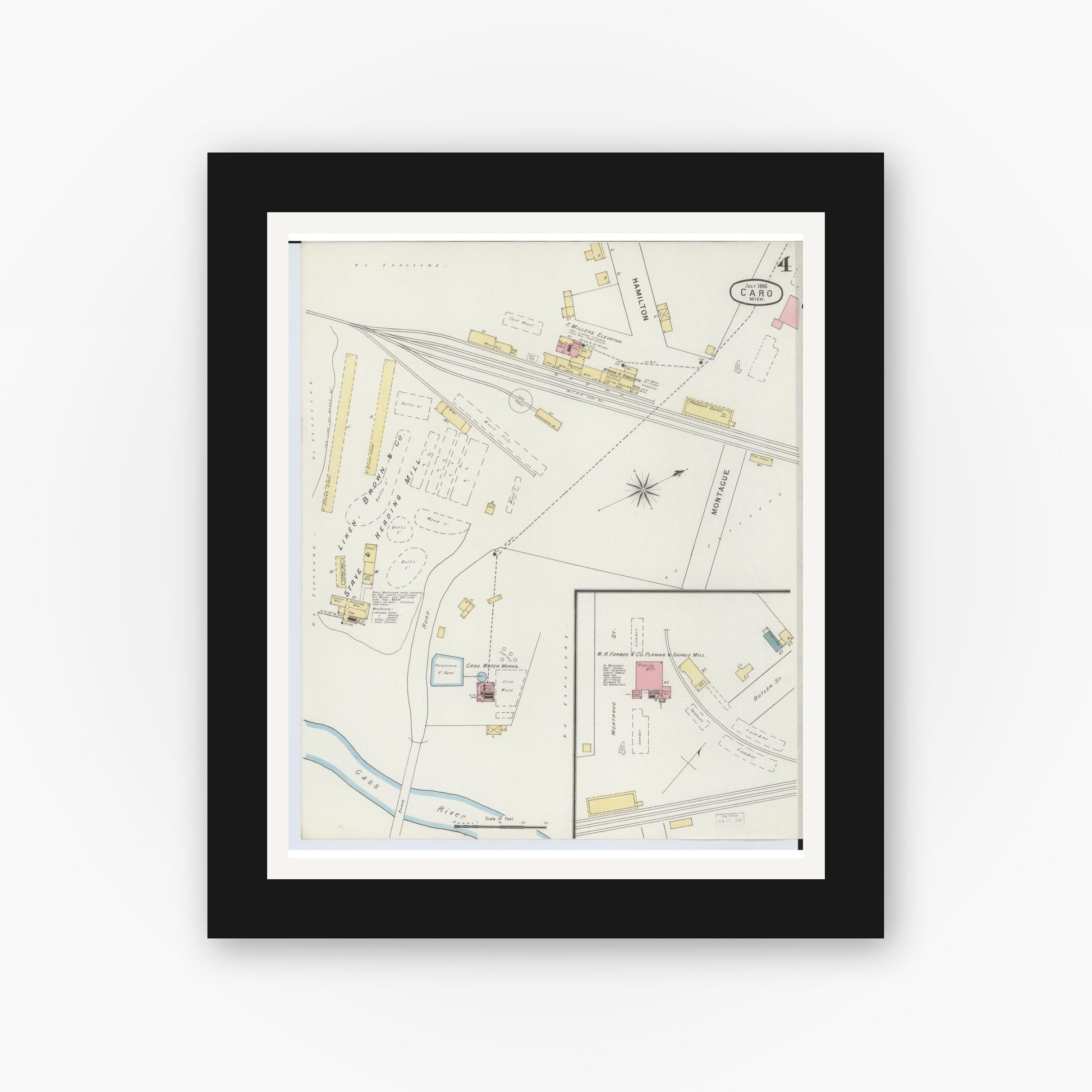 Old map wall art mockup — black gallery frame with white mat — Sanborn Fire Insurance Map from Caro, Tuscola County, Michigan (1895), Sheet #0004