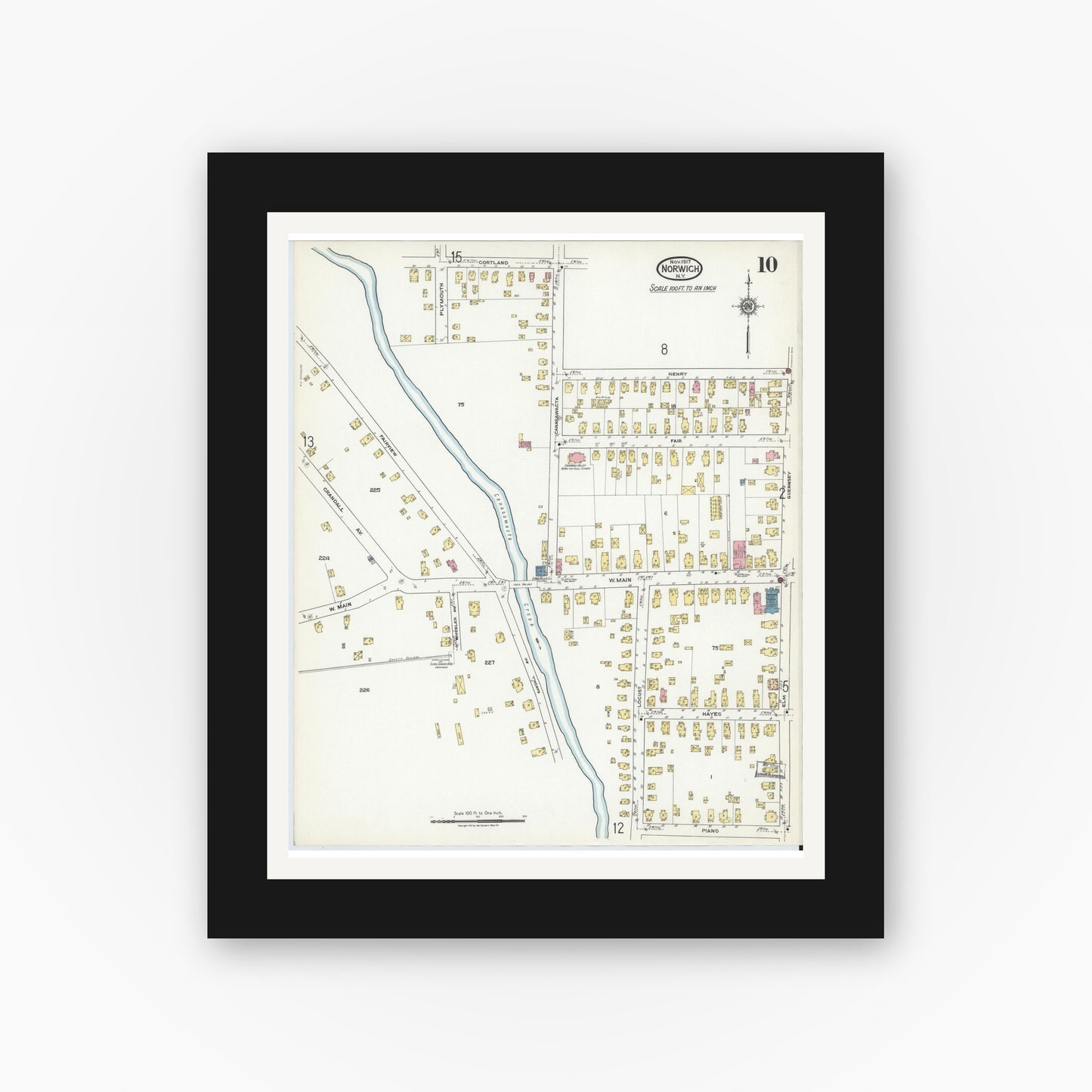 Old map wall art mockup — black gallery frame with white mat — Sanborn Fire Insurance Map from Norwich, Chenango County, New York (1917), Sheet #0010