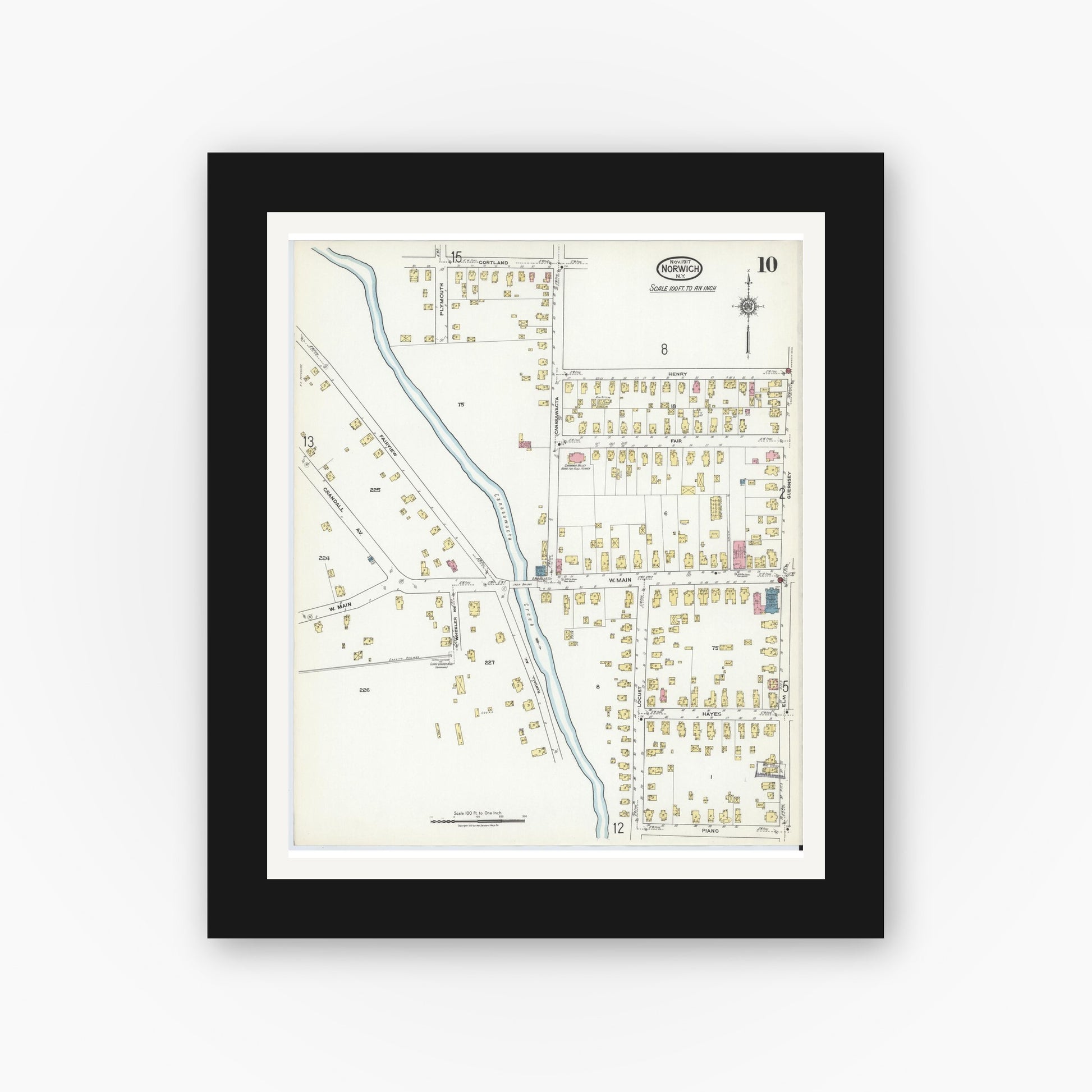 Old map wall art mockup — black gallery frame with white mat — Sanborn Fire Insurance Map from Norwich, Chenango County, New York (1917), Sheet #0010