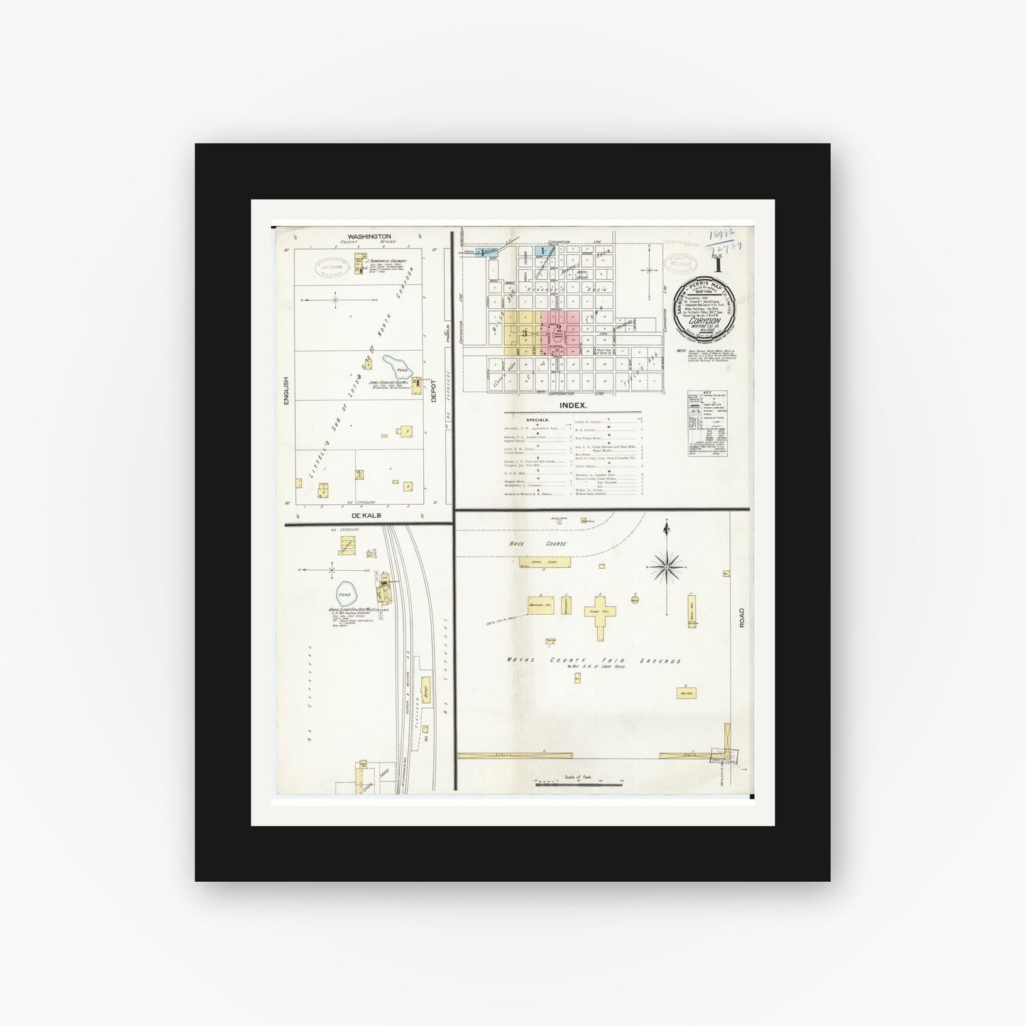Old map wall art mockup — black gallery frame with white mat — Sanborn Fire Insurance Map from Corydon, Wayne County, Iowa (1898) â€” Complete Set