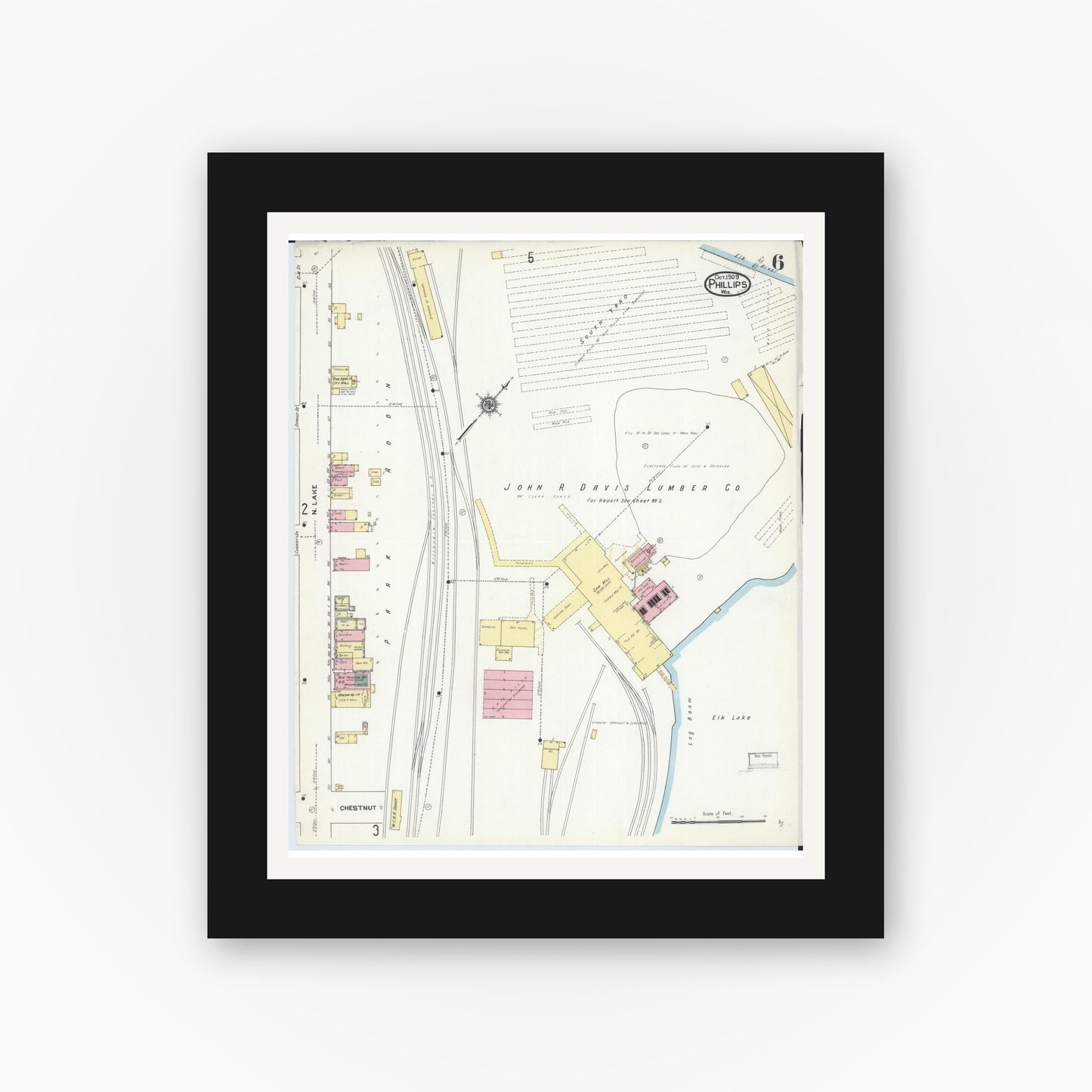 Old map wall art mockup — black gallery frame with white mat — Sanborn Fire Insurance Map from Phillips, Price County, Wisconsin (1909), Sheet #0006
