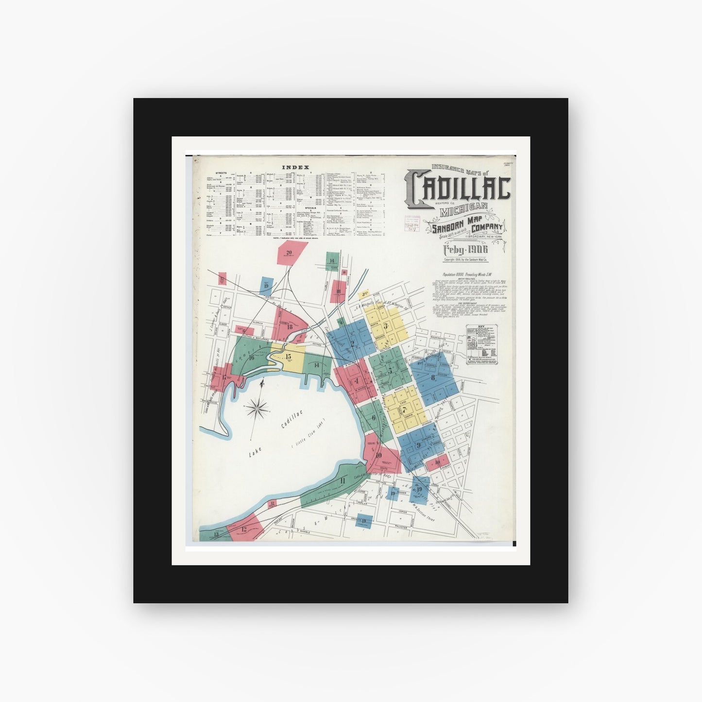 Old map wall art mockup — black gallery frame with white mat — Sanborn Fire Insurance Map from Cadillac, Wexford County, Michigan (1906), Sheet #0001