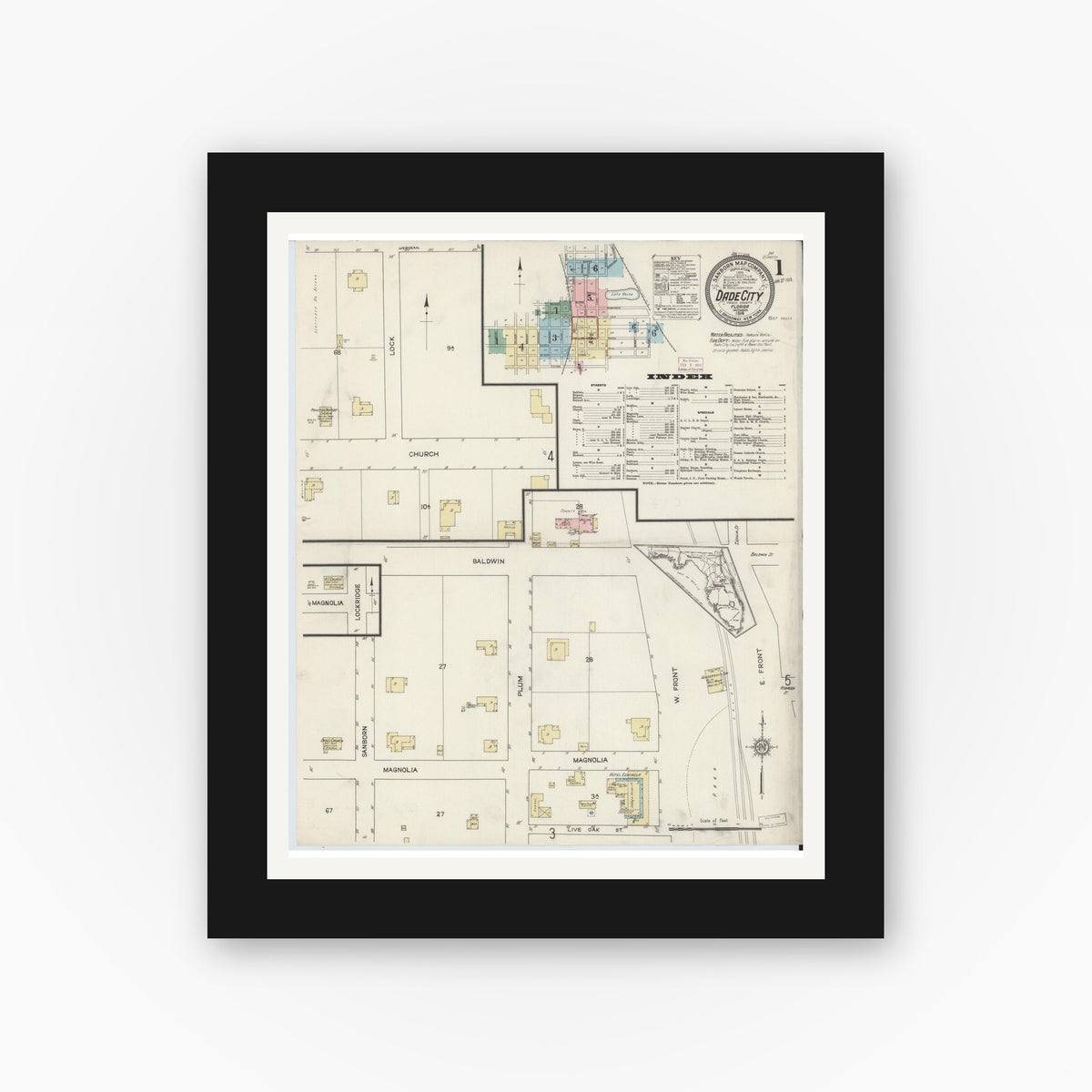 Old map wall art mockup — black gallery frame with white mat — Sanborn Fire Insurance Map from Dade City, Pasco County, Florida (1914), Sheet #0001