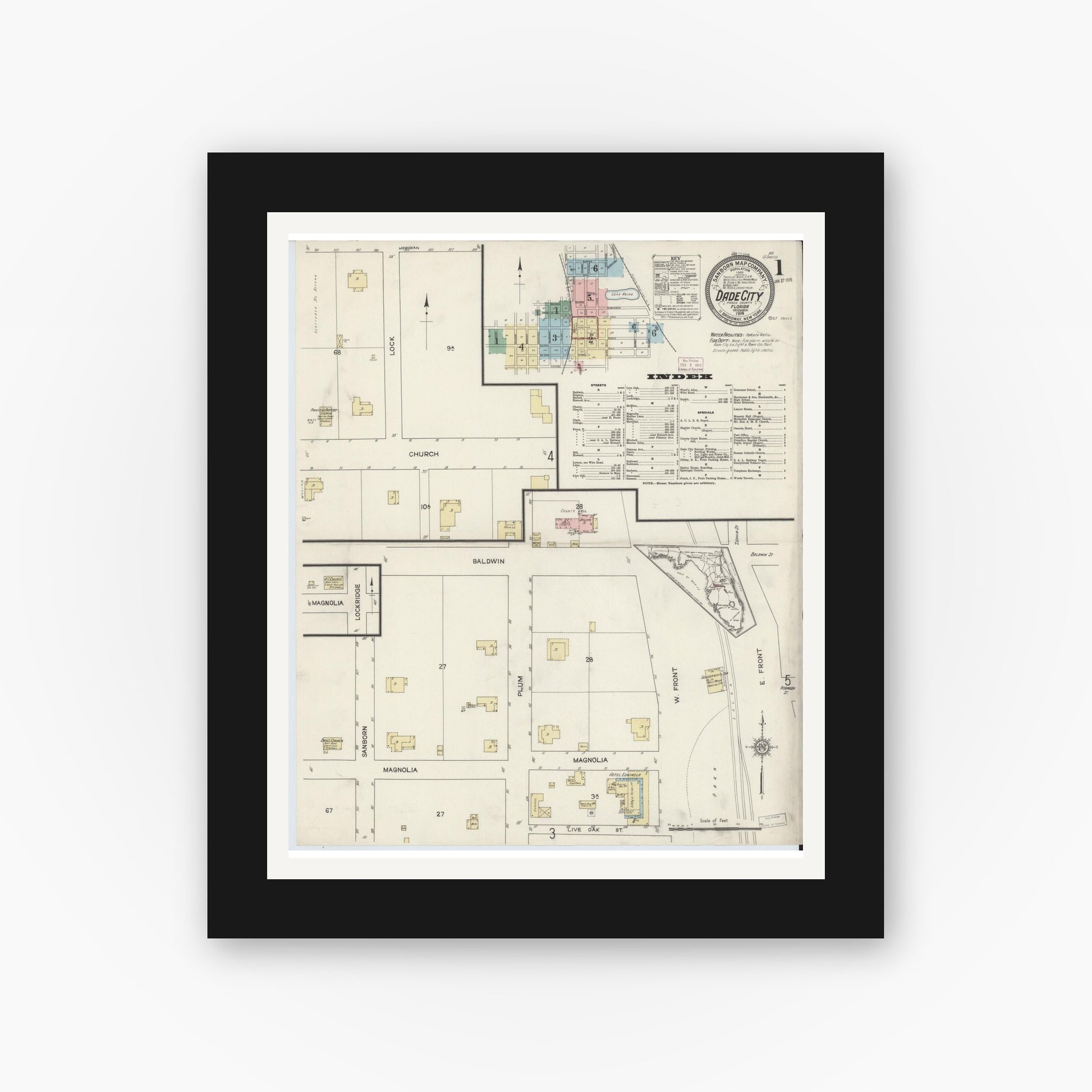 Old map wall art mockup — black gallery frame with white mat — Sanborn Fire Insurance Map from Dade City, Pasco County, Florida (1914), Sheet #0001