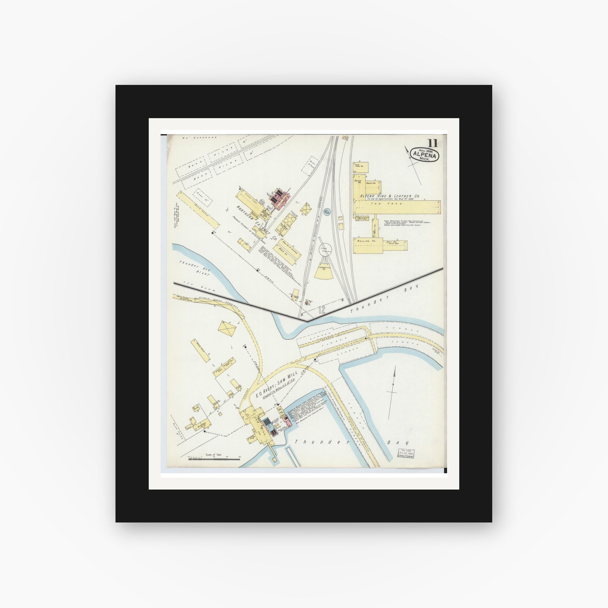 Old map wall art mockup — black gallery frame with white mat — Sanborn Fire Insurance Map from Alpena, Alpena County, Michigan (1895), Sheet #0011