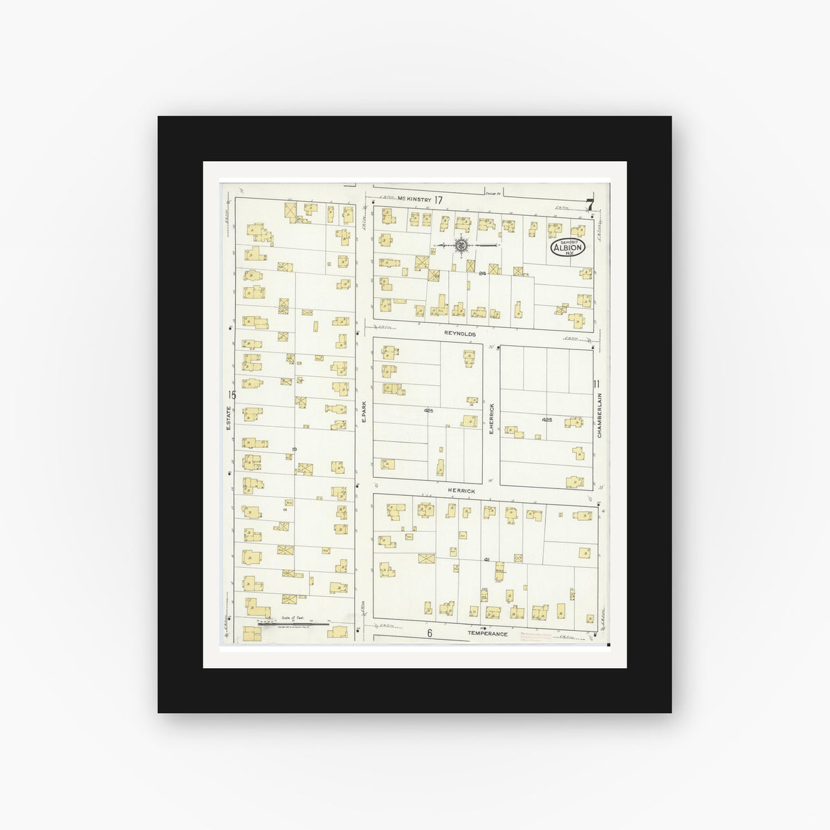 Old map wall art mockup — black gallery frame with white mat — Sanborn Fire Insurance Map from Albion, Orleans County, New York (1917), Sheet #0007
