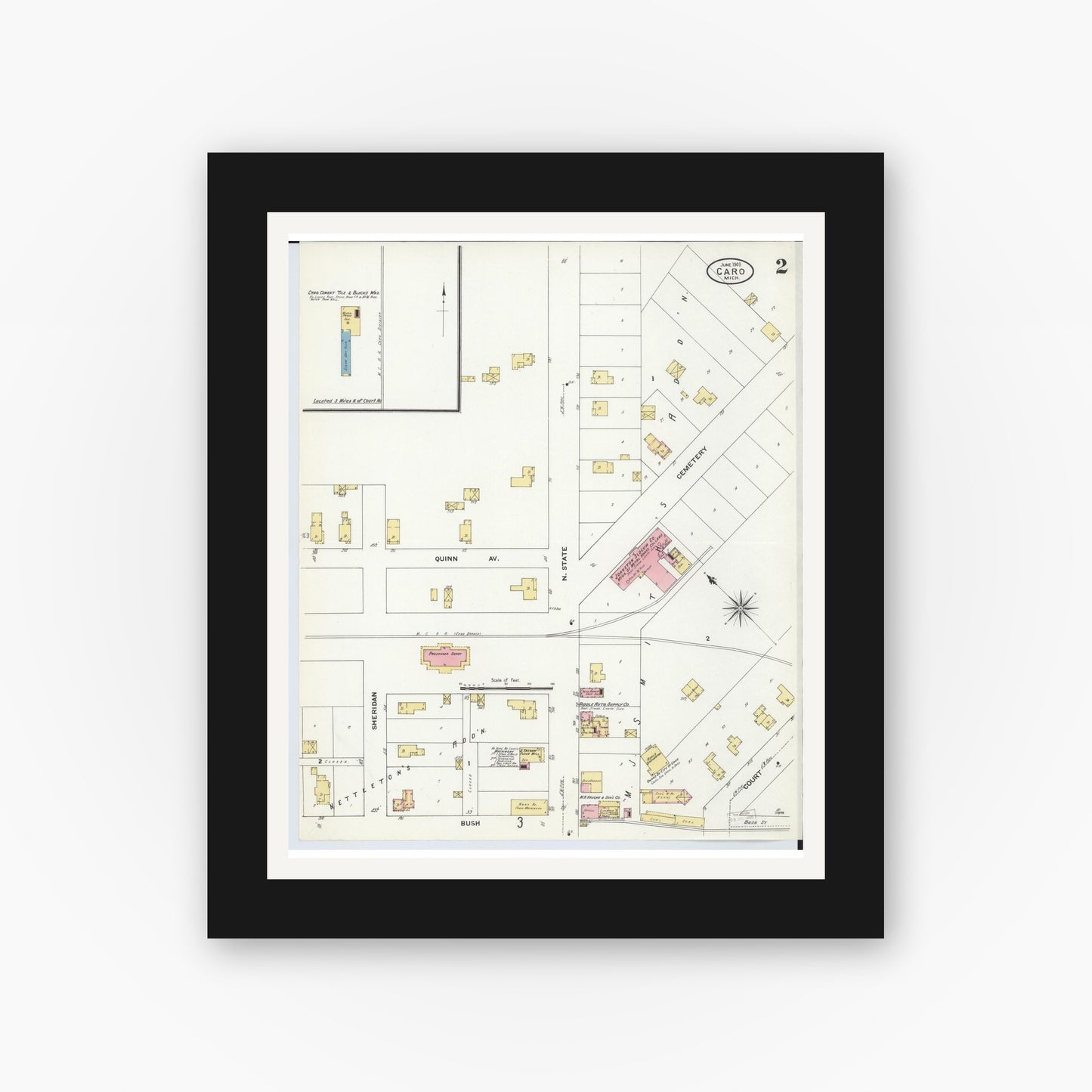 Old map wall art mockup — black gallery frame with white mat — Sanborn Fire Insurance Map from Caro, Tuscola County, Michigan (1909), Sheet #0002