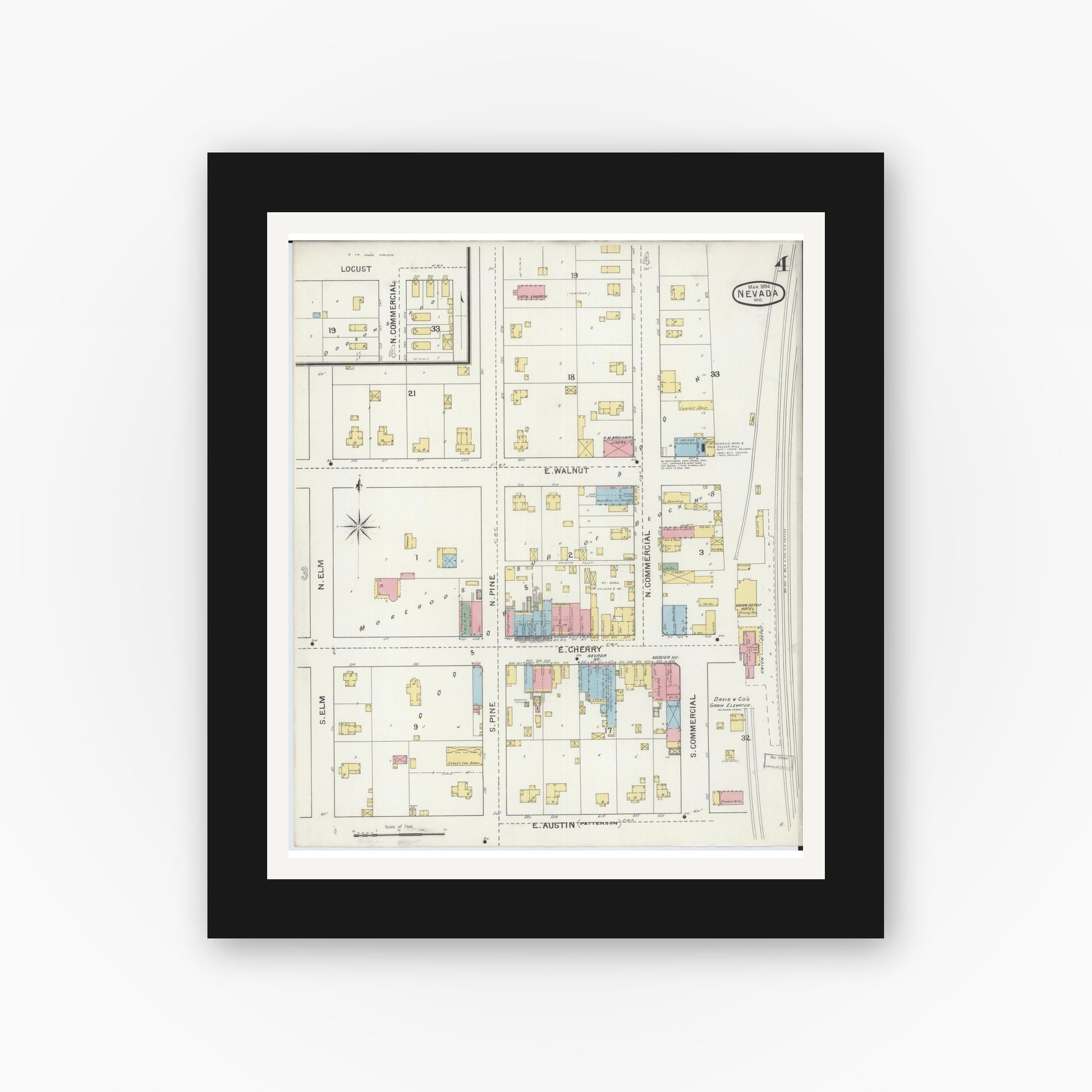 Old map wall art mockup — black gallery frame with white mat — Sanborn Fire Insurance Map from Nevada, Vernon County, Missouri (1894), Sheet #0004