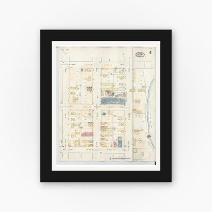 Old map wall art mockup — black gallery frame with white mat — Sanborn Fire Insurance Map from Evart, Osceola County, Michigan (1942), Sheet #0004