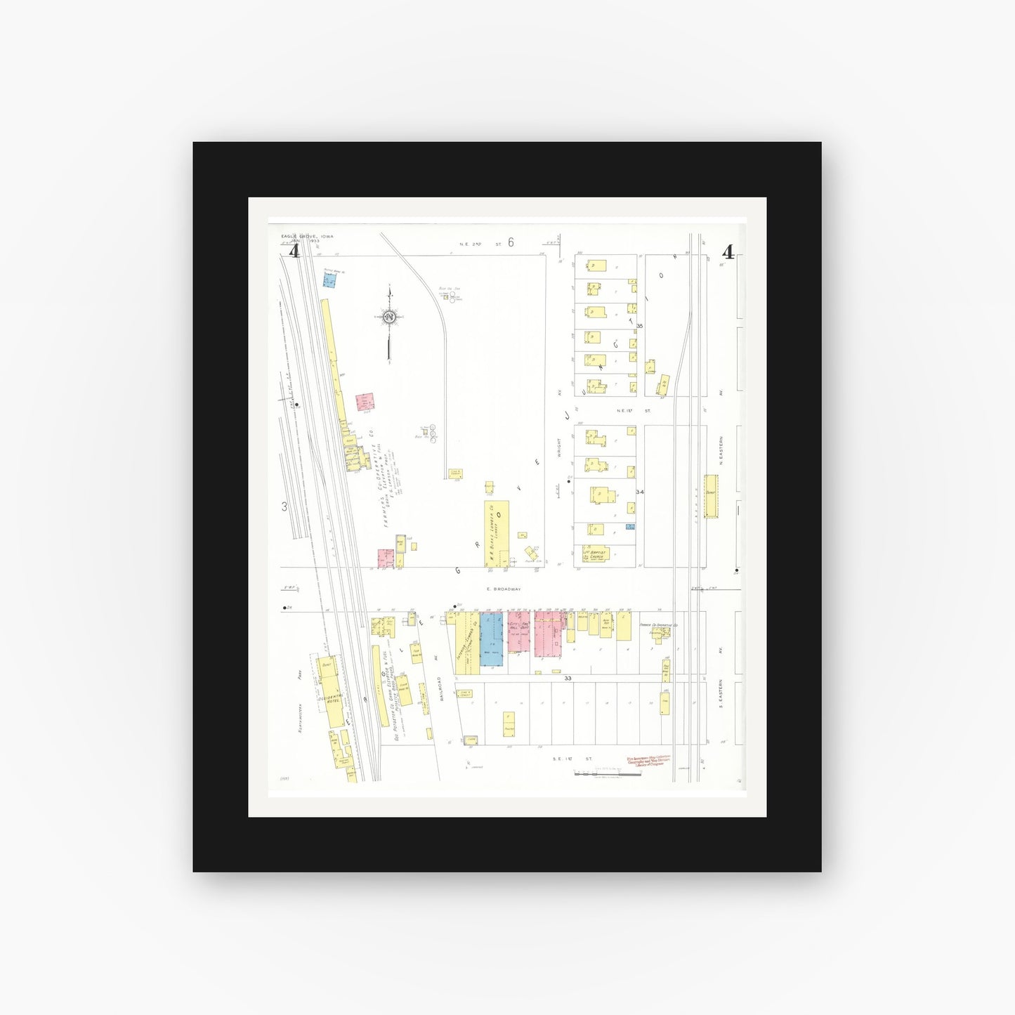 Old map wall art mockup — black gallery frame with white mat — Sanborn Fire Insurance Map from Eagle Grove, Wright County, Iowa (1933), Sheet #0004