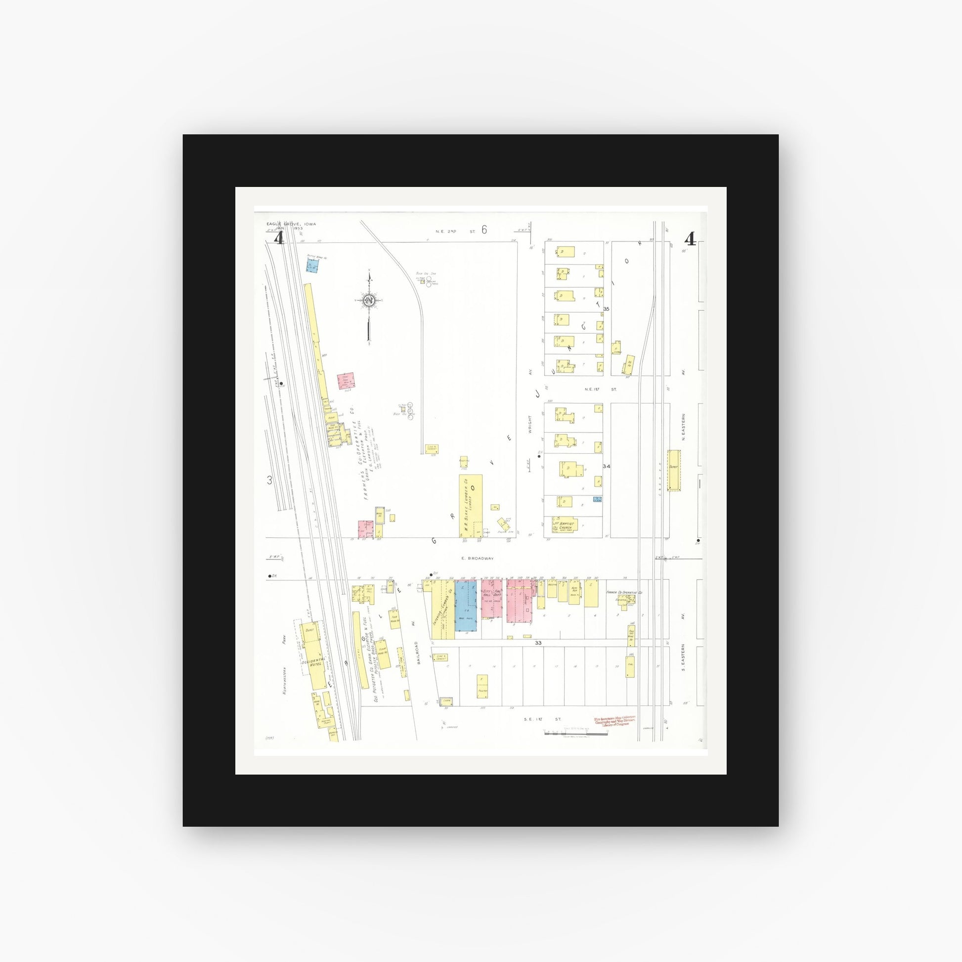 Old map wall art mockup — black gallery frame with white mat — Sanborn Fire Insurance Map from Eagle Grove, Wright County, Iowa (1933), Sheet #0004