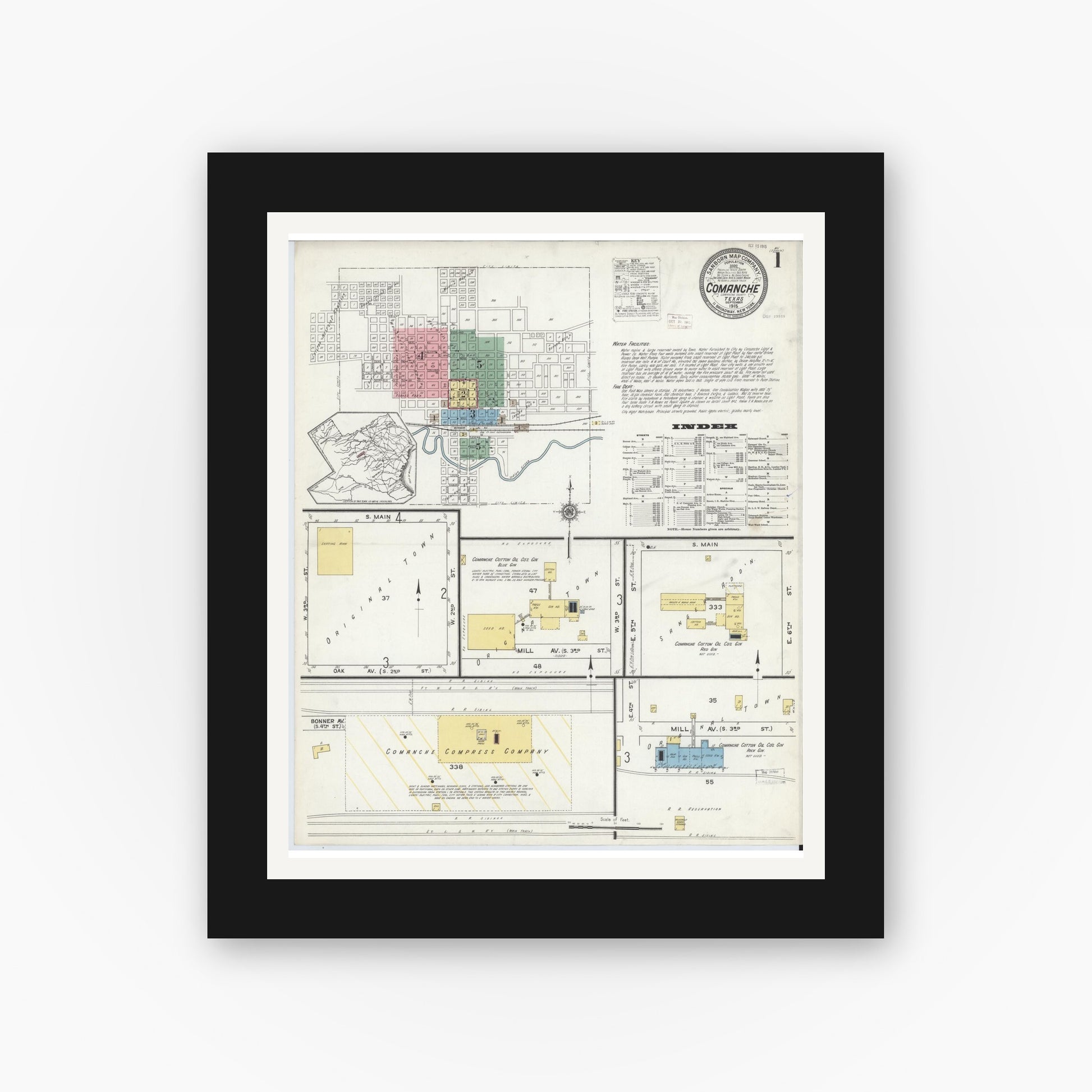 Old map wall art mockup — black gallery frame with white mat — Sanborn Fire Insurance Map from Comanche, Comanche County, Texas (1915), Sheet #0001