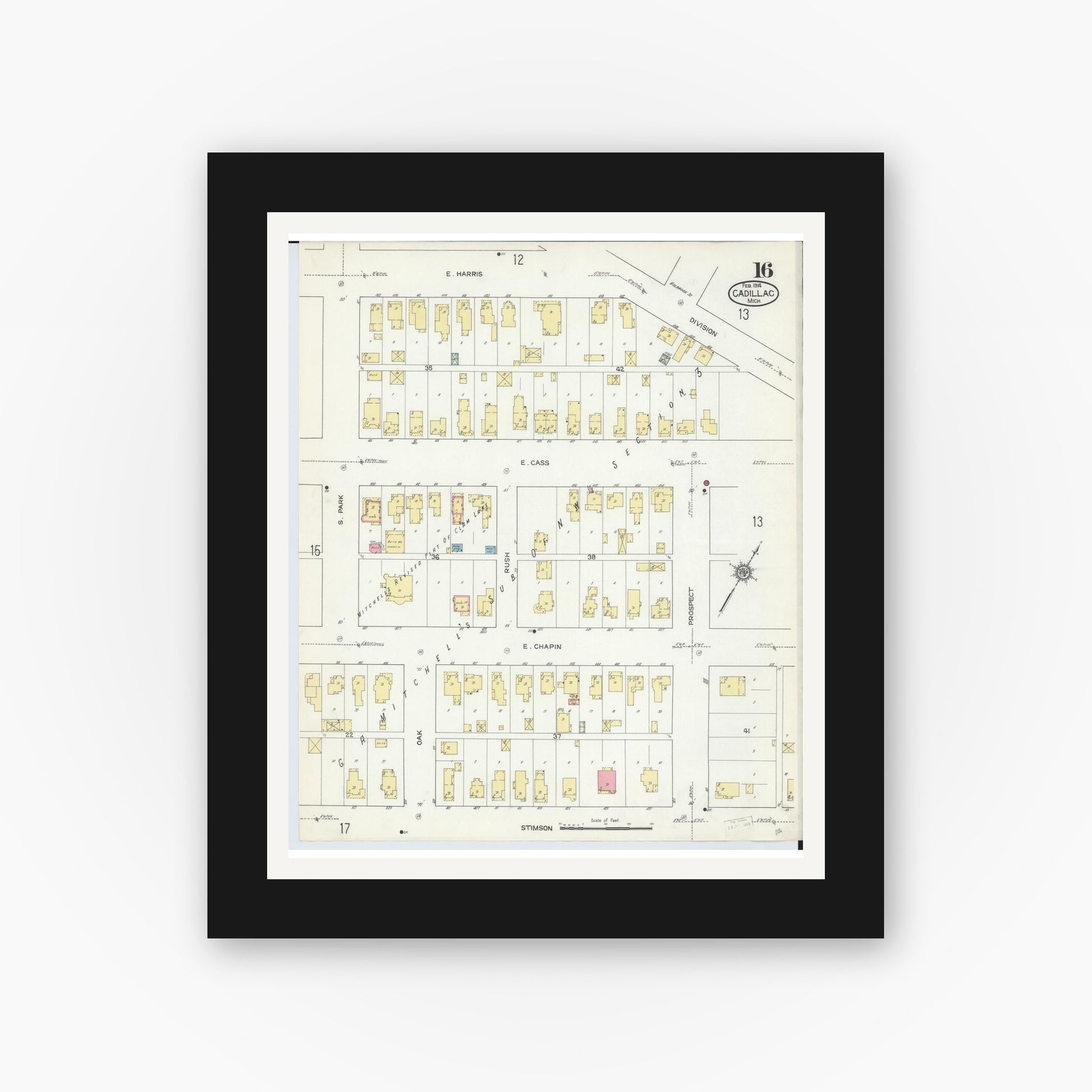 Old map wall art mockup — black gallery frame with white mat — Sanborn Fire Insurance Map from Cadillac, Wexford County, Michigan (1914), Sheet #0016
