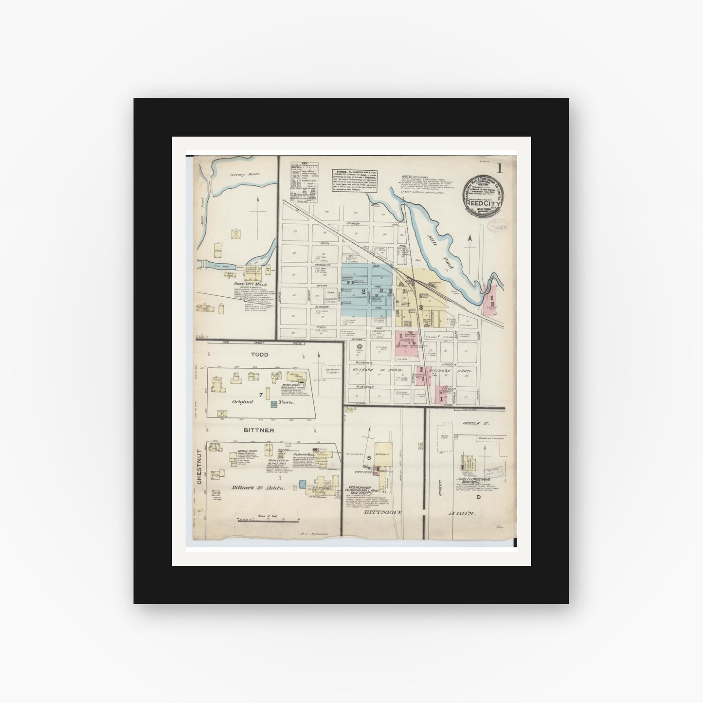 Old map wall art mockup — black gallery frame with white mat — Sanborn Fire Insurance Map from Reed City, Osceola County, Michigan (1884) - Complete Map Set