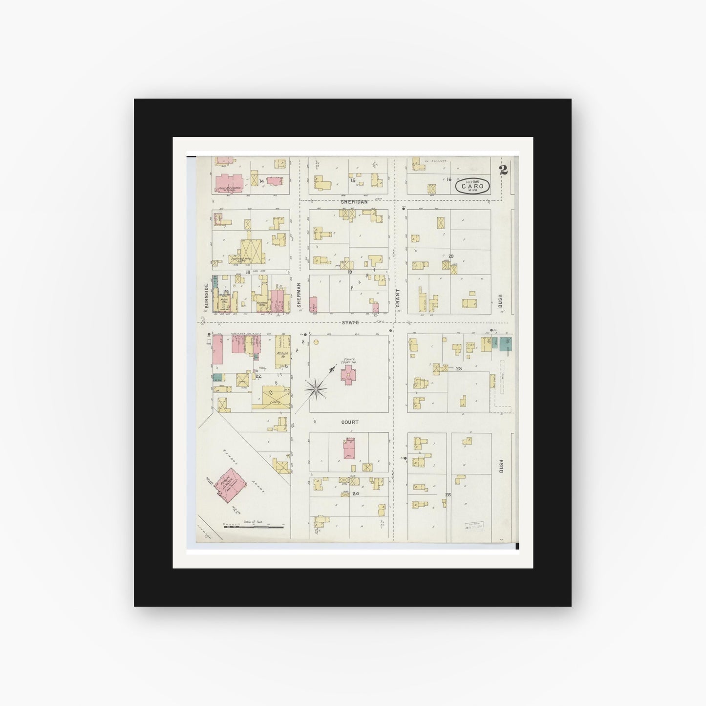 Old map wall art mockup — black gallery frame with white mat — Sanborn Fire Insurance Map from Caro, Tuscola County, Michigan (1895), Sheet #0002