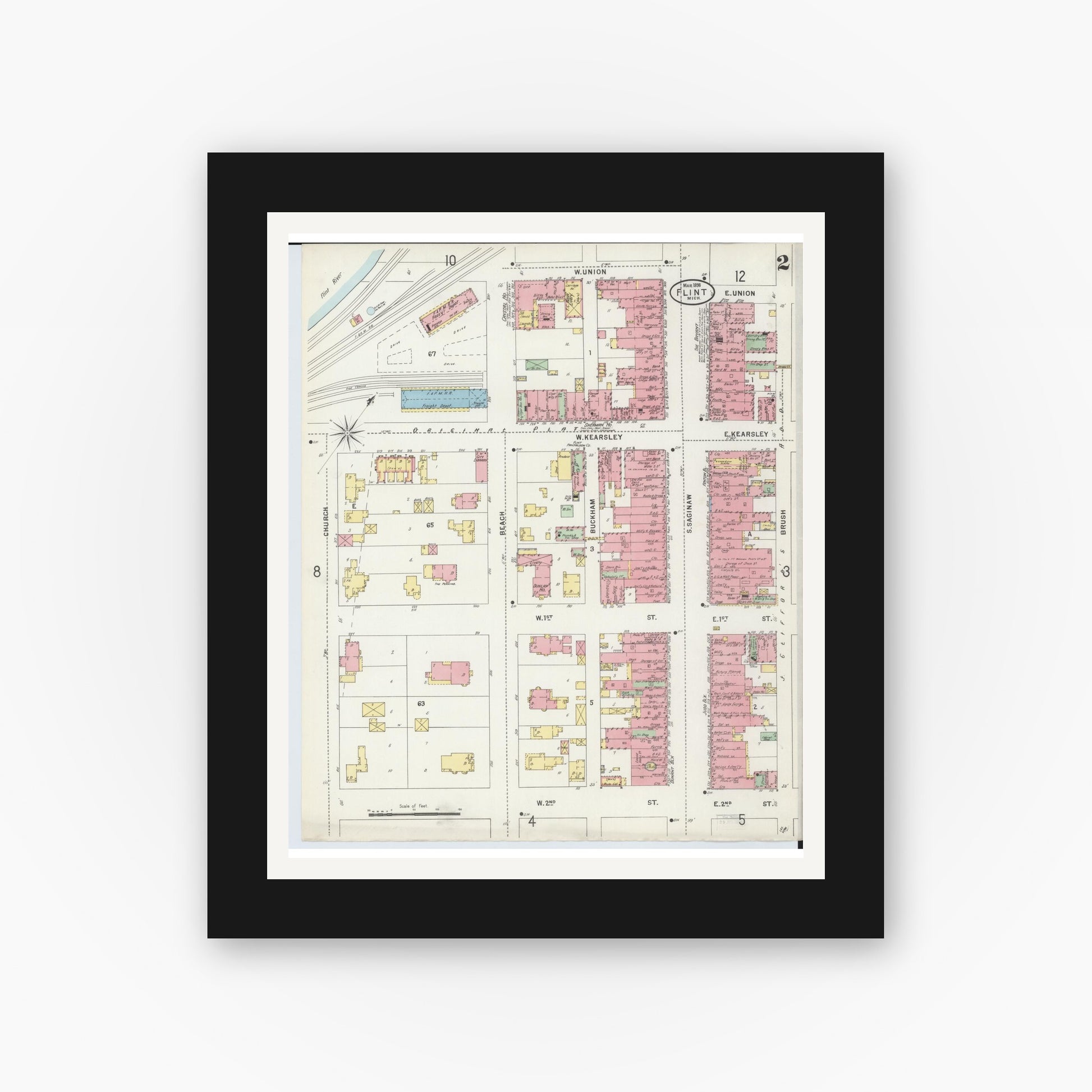 Old map wall art mockup — black gallery frame with white mat — Sanborn Fire Insurance Map from Flint, Genesee County, Michigan (1898), Sheet #0002