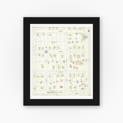 Old map wall art mockup — black gallery frame with white mat — Sanborn Fire Insurance Map from Nevada, Vernon County, Missouri (1906), Sheet #0002