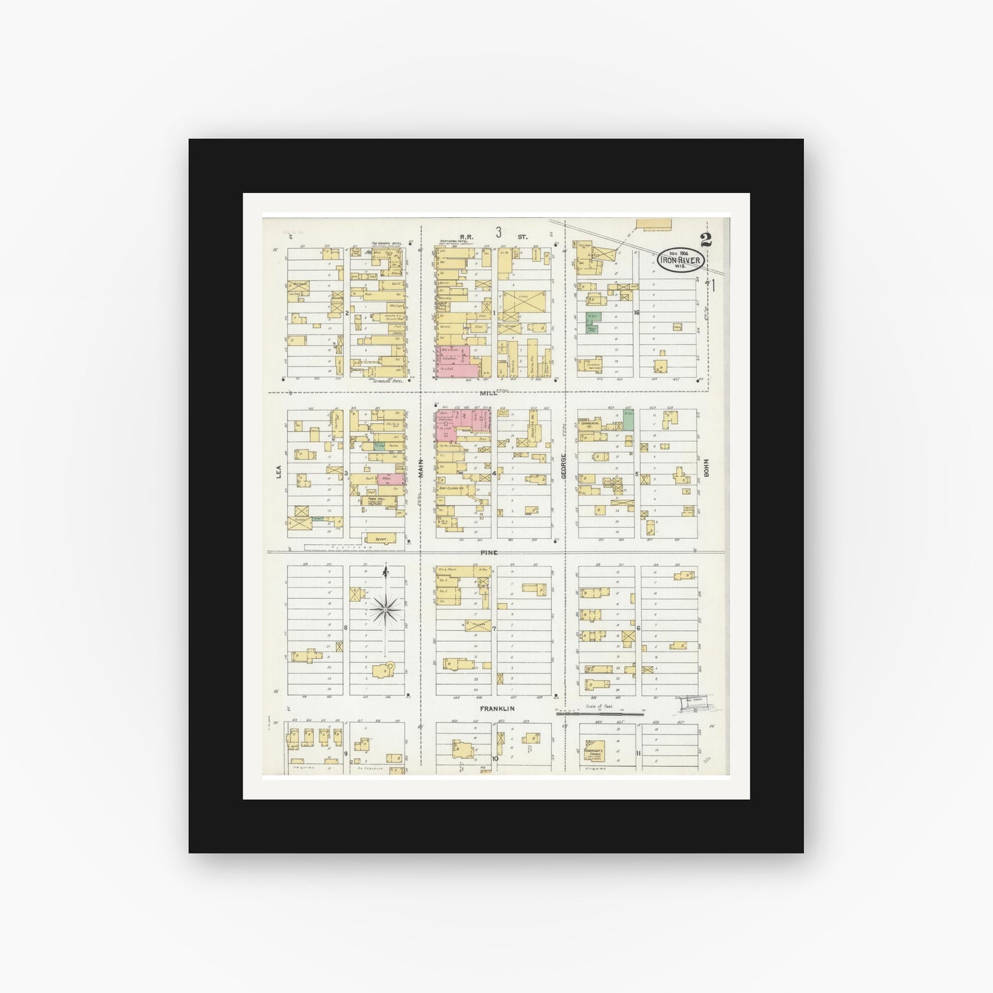 Old map wall art mockup — black gallery frame with white mat — Sanborn Fire Insurance Map from Iron River, Bayfield County, Wisconsin (1904), Sheet #0002