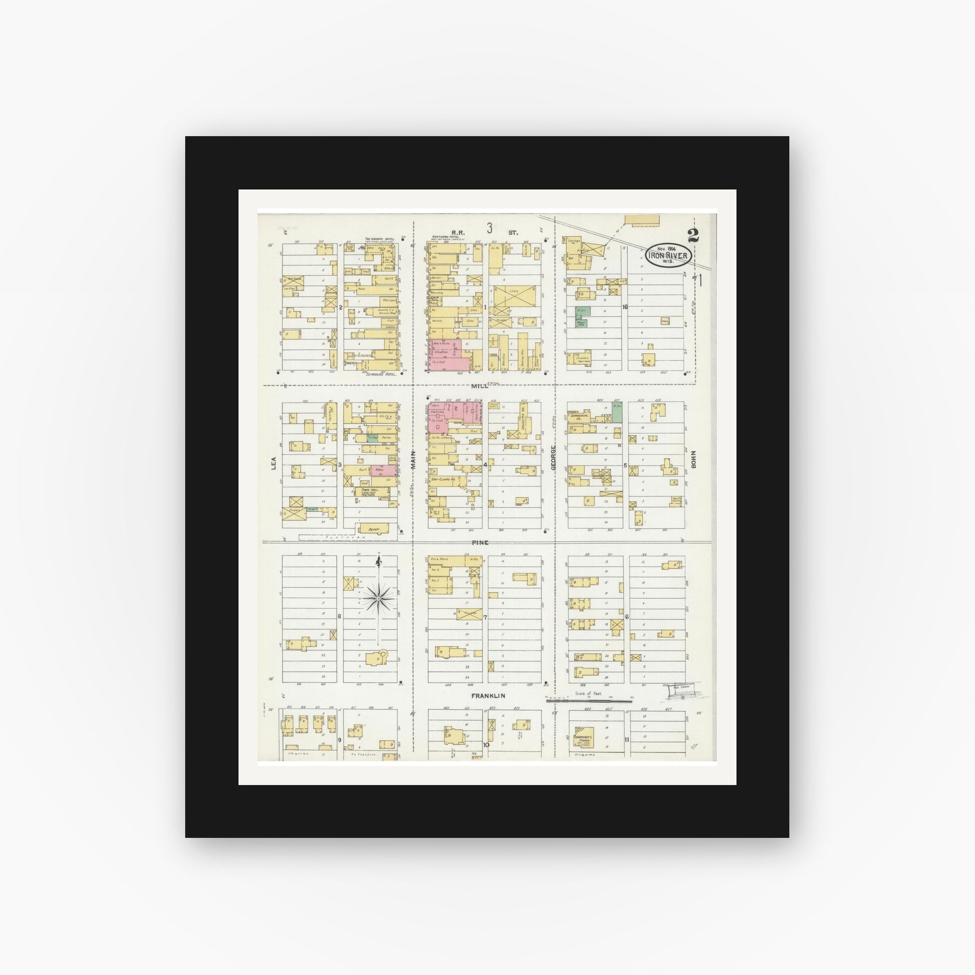 Old map wall art mockup — black gallery frame with white mat — Sanborn Fire Insurance Map from Iron River, Bayfield County, Wisconsin (1904), Sheet #0002
