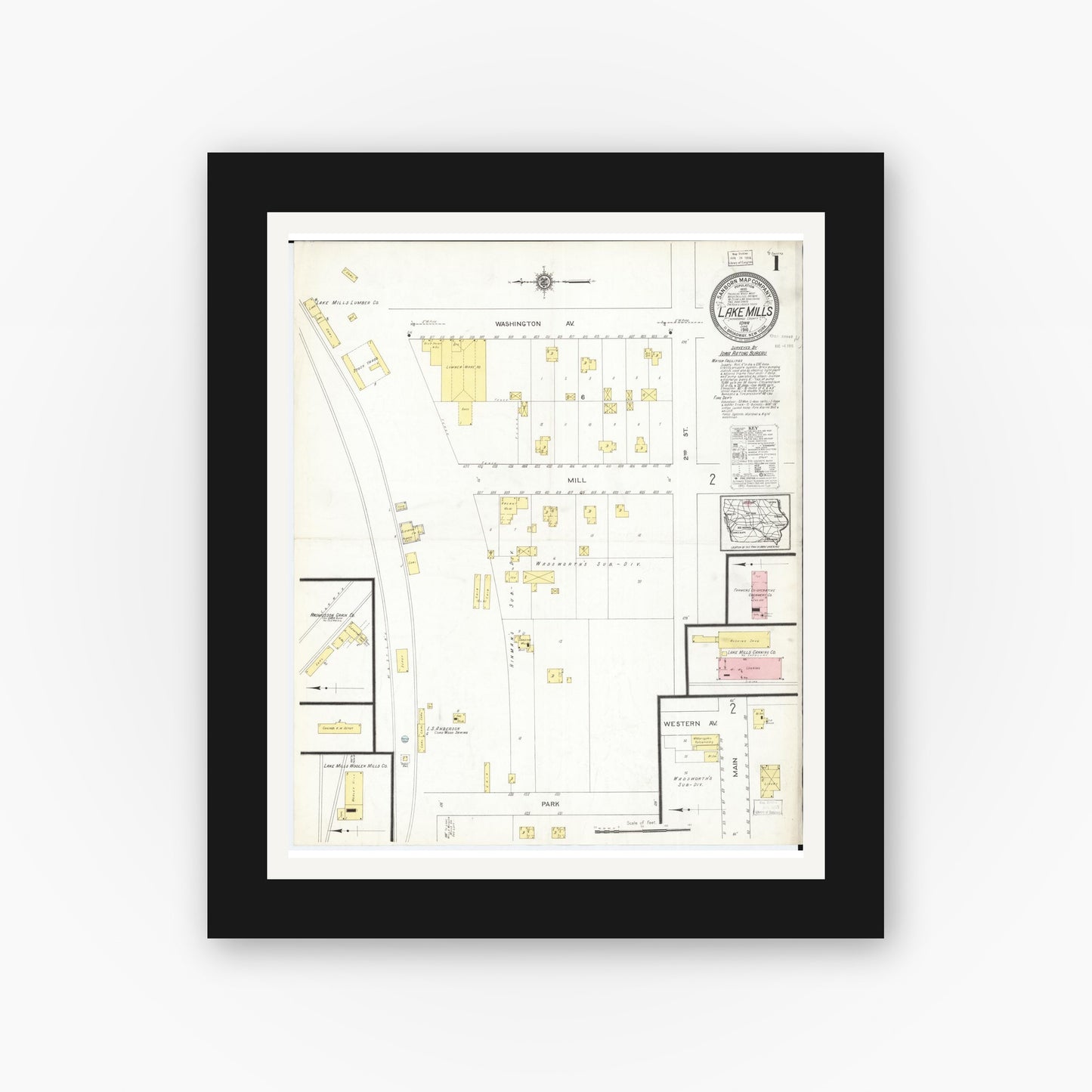 Old map wall art mockup — black gallery frame with white mat — Sanborn Fire Insurance Map from Lake Mills, Winnebago County, Iowa (1916) â€” Complete Set