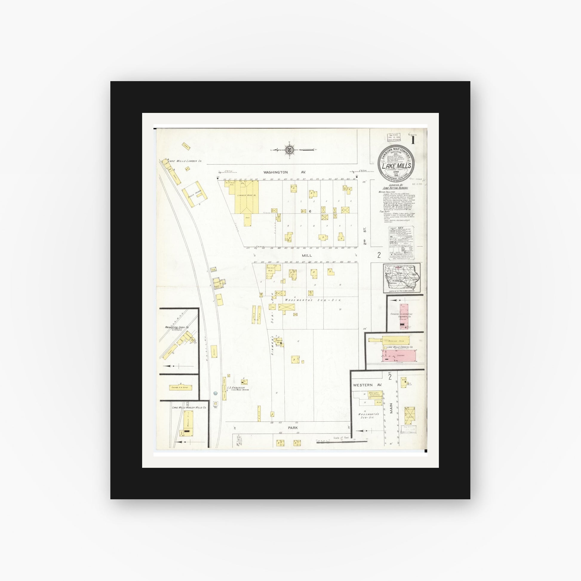 Old map wall art mockup — black gallery frame with white mat — Sanborn Fire Insurance Map from Lake Mills, Winnebago County, Iowa (1916) â€” Complete Set