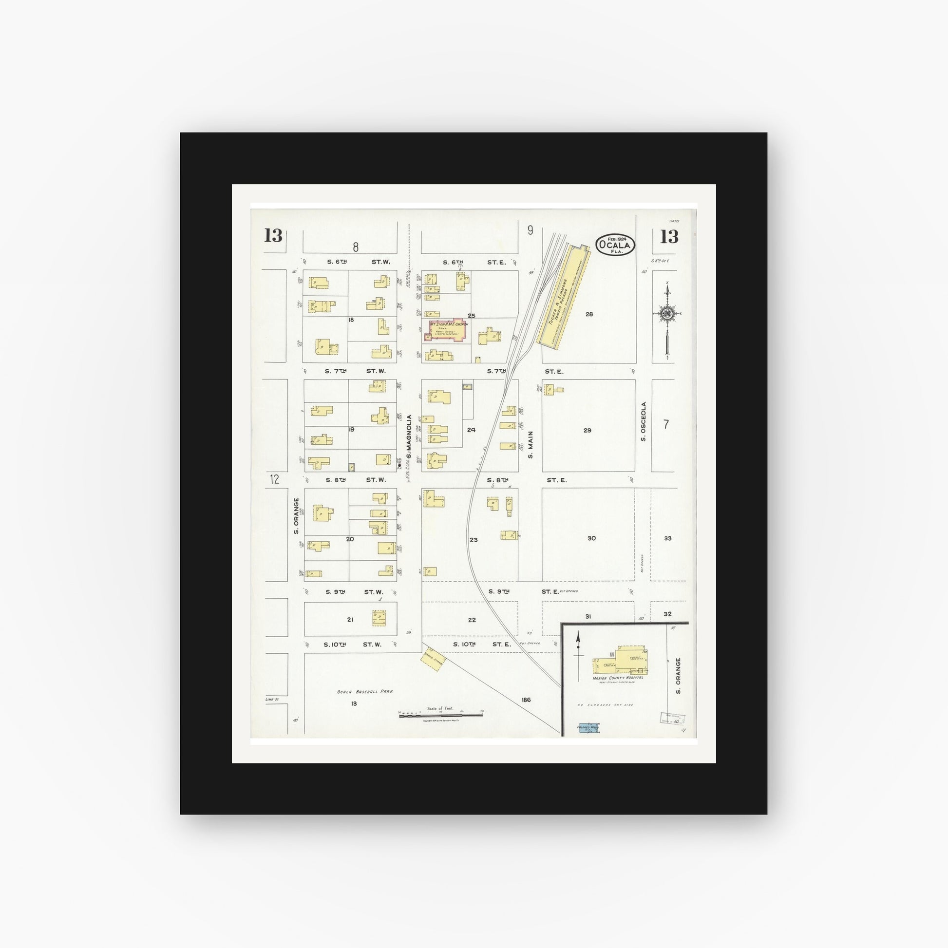 Old map wall art mockup — black gallery frame with white mat — Sanborn Fire Insurance Map from Ocala, Marion County, Florida (1924), Sheet #0013