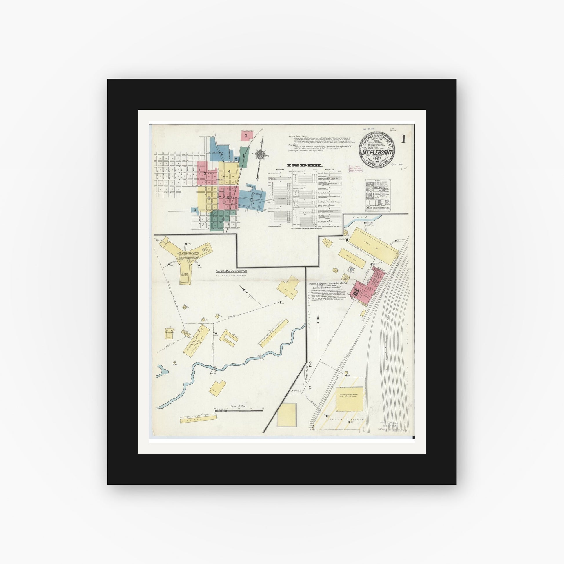 Old map wall art mockup — black gallery frame with white mat — Sanborn Fire Insurance Map from Mount Pleasant, Titus County, Texas (1911), Sheet #0001