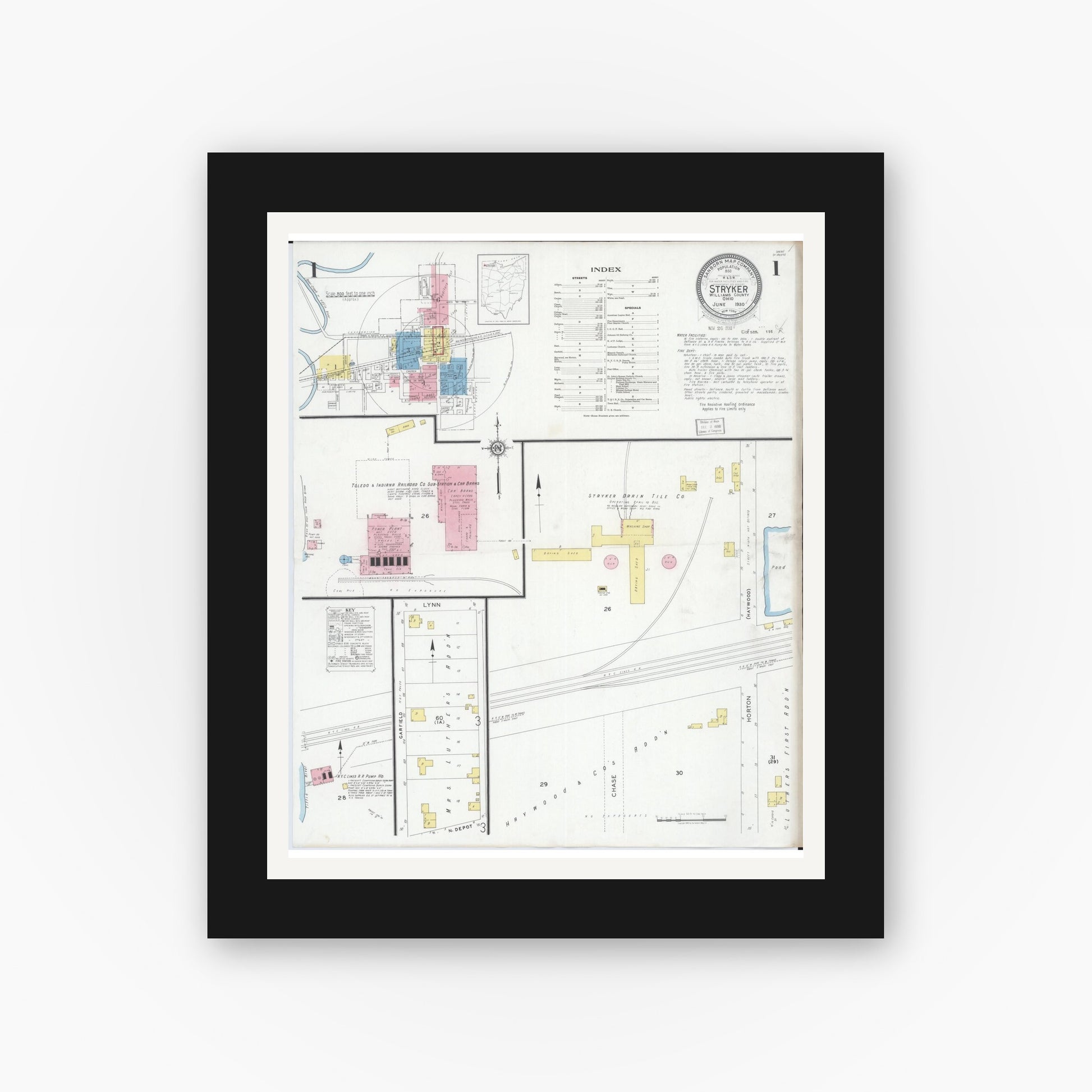 Old map wall art mockup — black gallery frame with white mat — Sanborn Fire Insurance Map from Stryker, Williams County, Ohio (1930), Sheet #0001