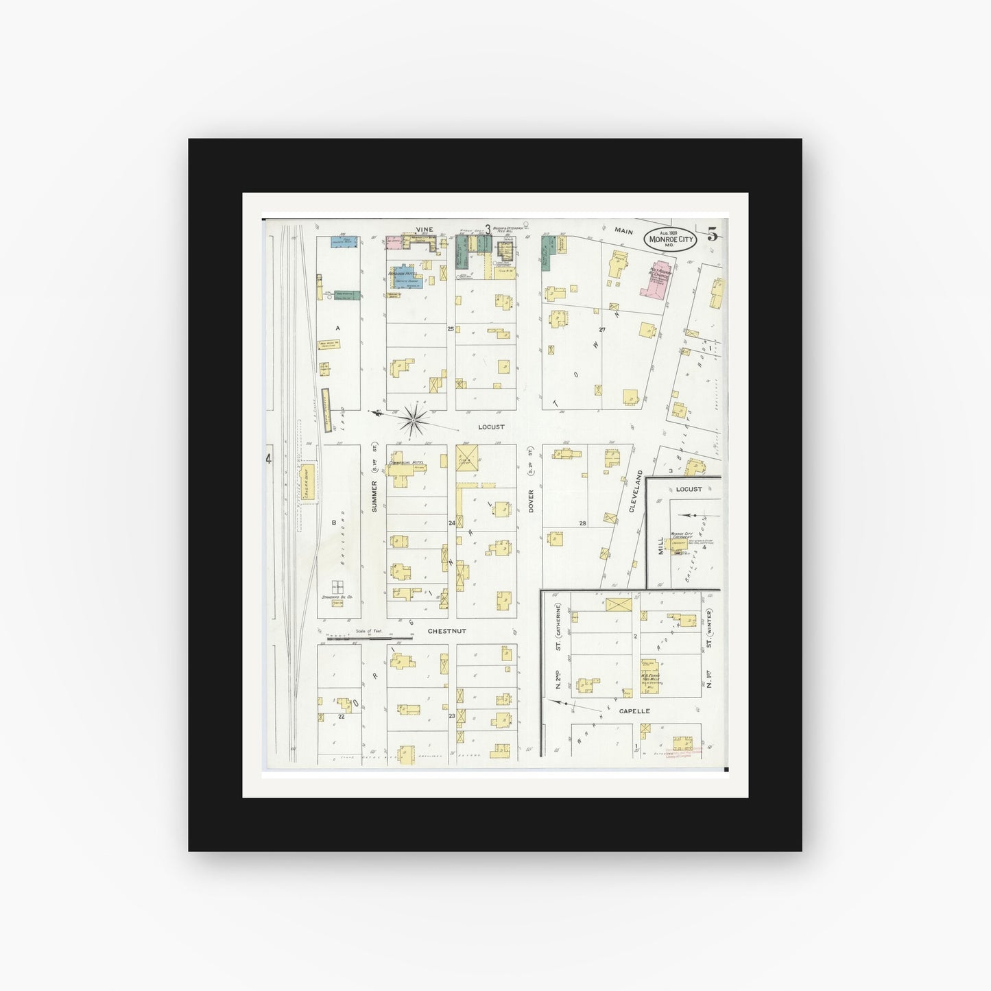 Old map wall art mockup — black gallery frame with white mat — Sanborn Fire Insurance Map from Monroe City, Monroe County, Missouri (1909), Sheet #0005