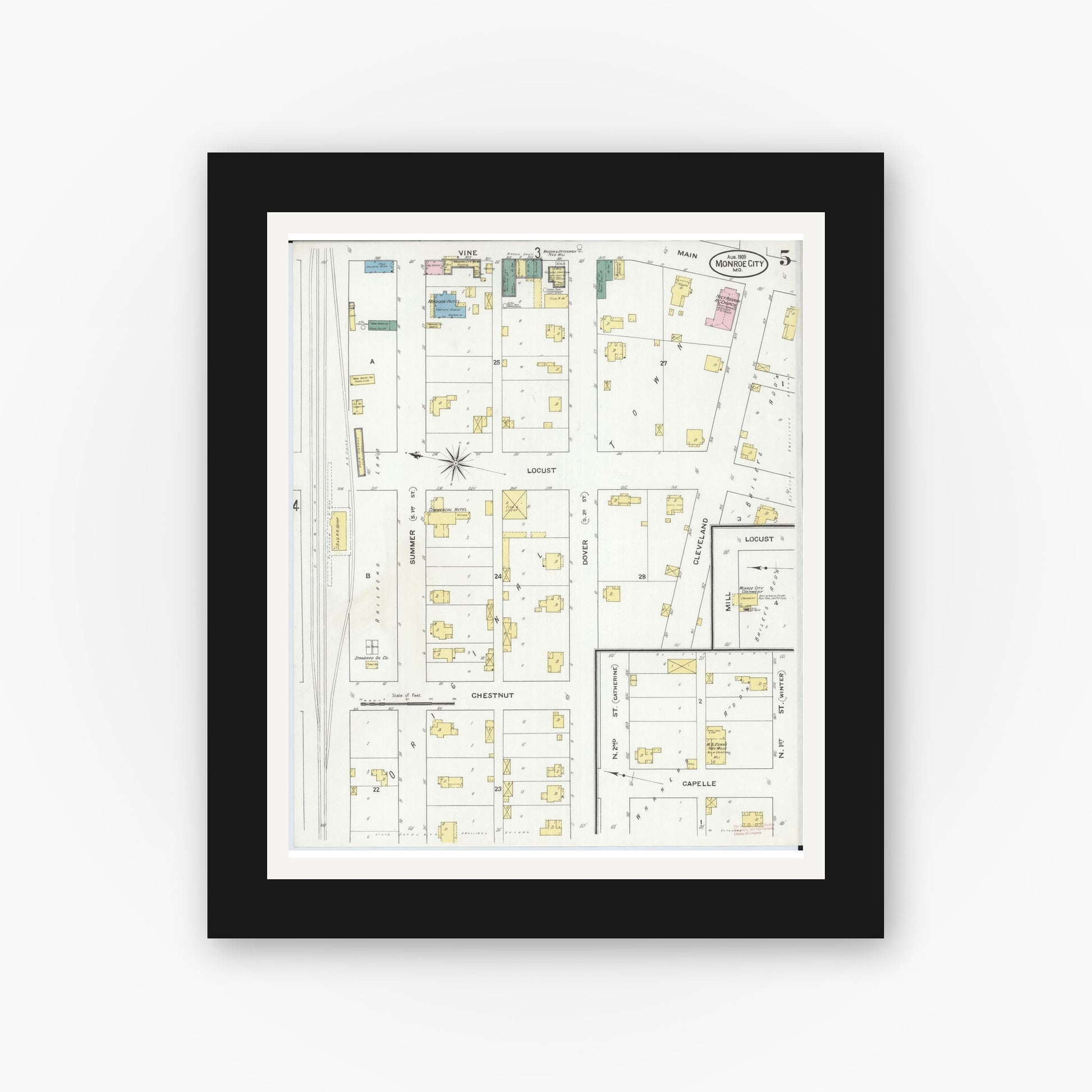 Old map wall art mockup — black gallery frame with white mat — Sanborn Fire Insurance Map from Monroe City, Monroe County, Missouri (1909), Sheet #0005