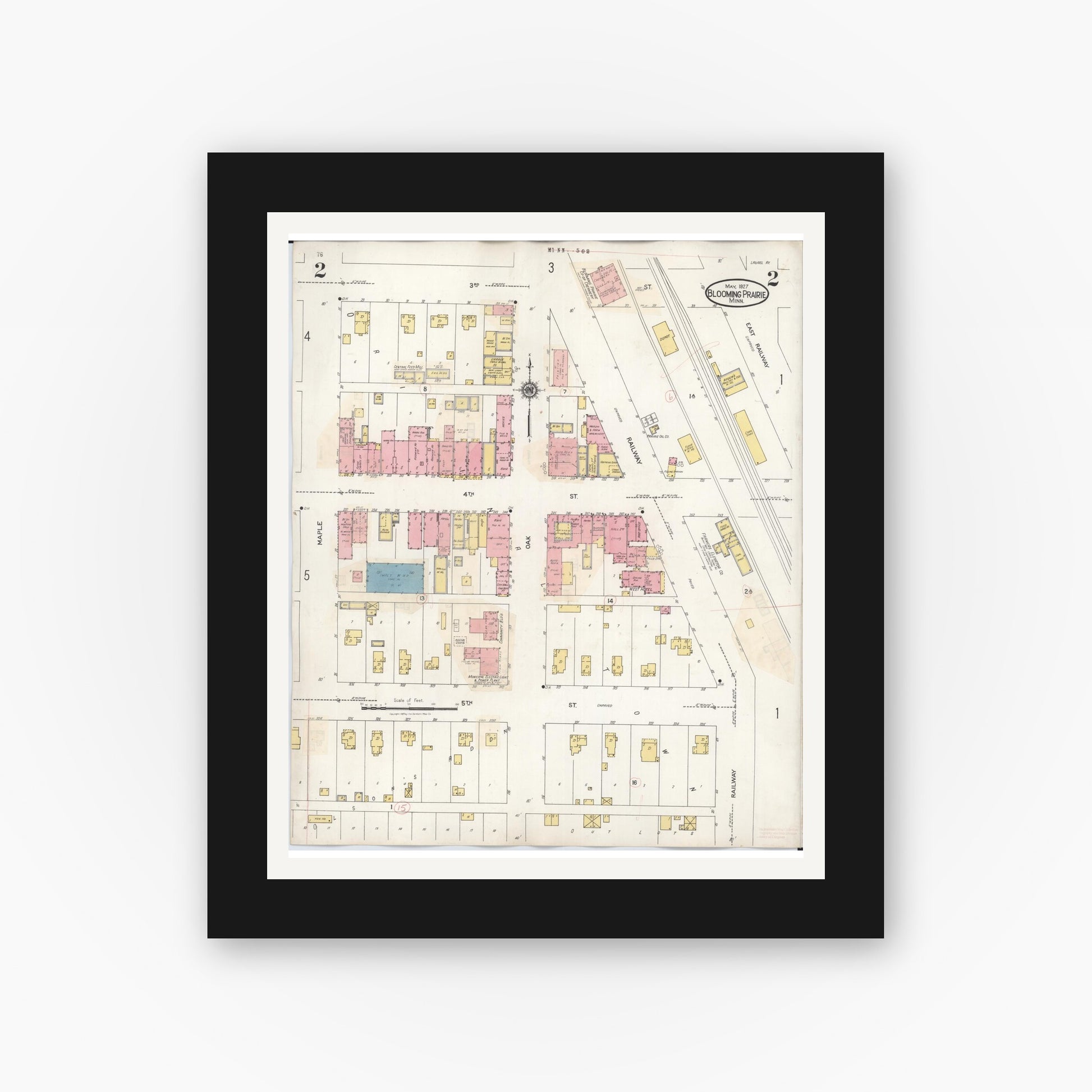 Old map wall art mockup — black gallery frame with white mat — Sanborn Fire Insurance Map from Blooming Prairie, Steele County, Minnesota (1937), Sheet #0002