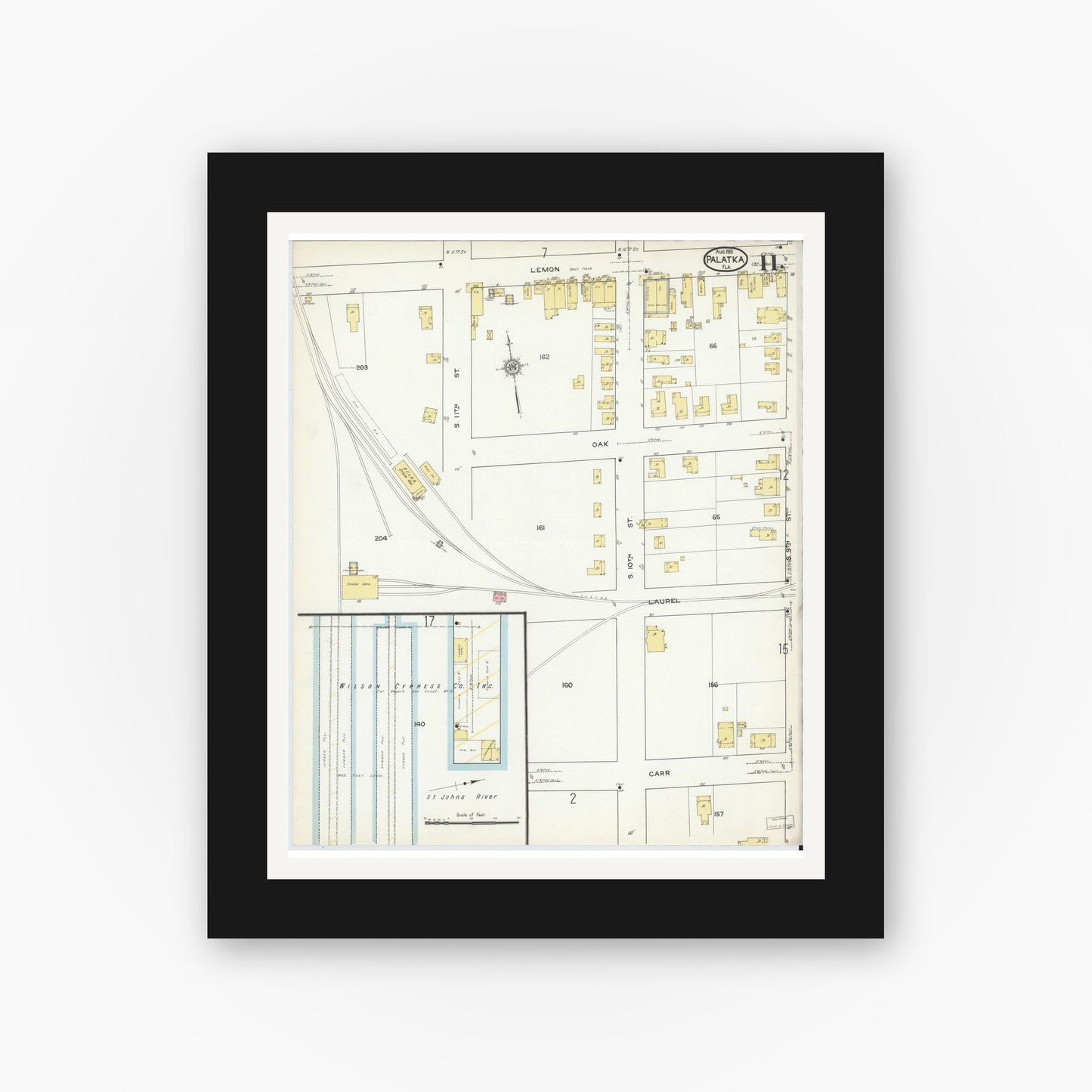 Old map wall art mockup — black gallery frame with white mat — Sanborn Fire Insurance Map from Palatka, Putnam County, Florida (1915), Sheet #0011