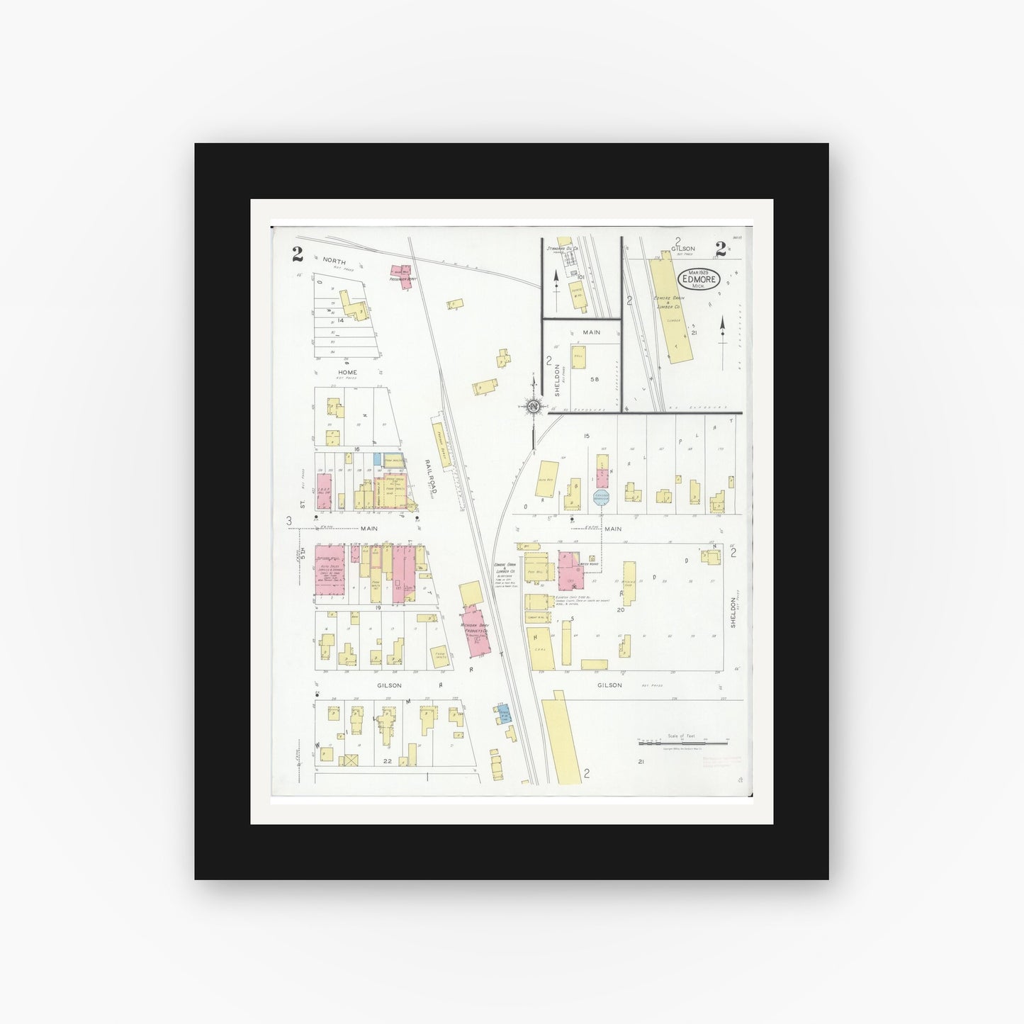 Old map wall art mockup — black gallery frame with white mat — Sanborn Fire Insurance Map from Edmore, Montcalm County, Michigan (1929), Sheet #0002
