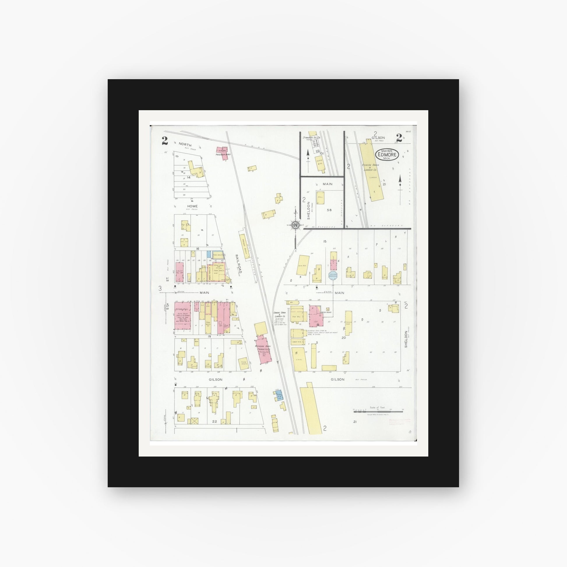 Old map wall art mockup — black gallery frame with white mat — Sanborn Fire Insurance Map from Edmore, Montcalm County, Michigan (1929), Sheet #0002