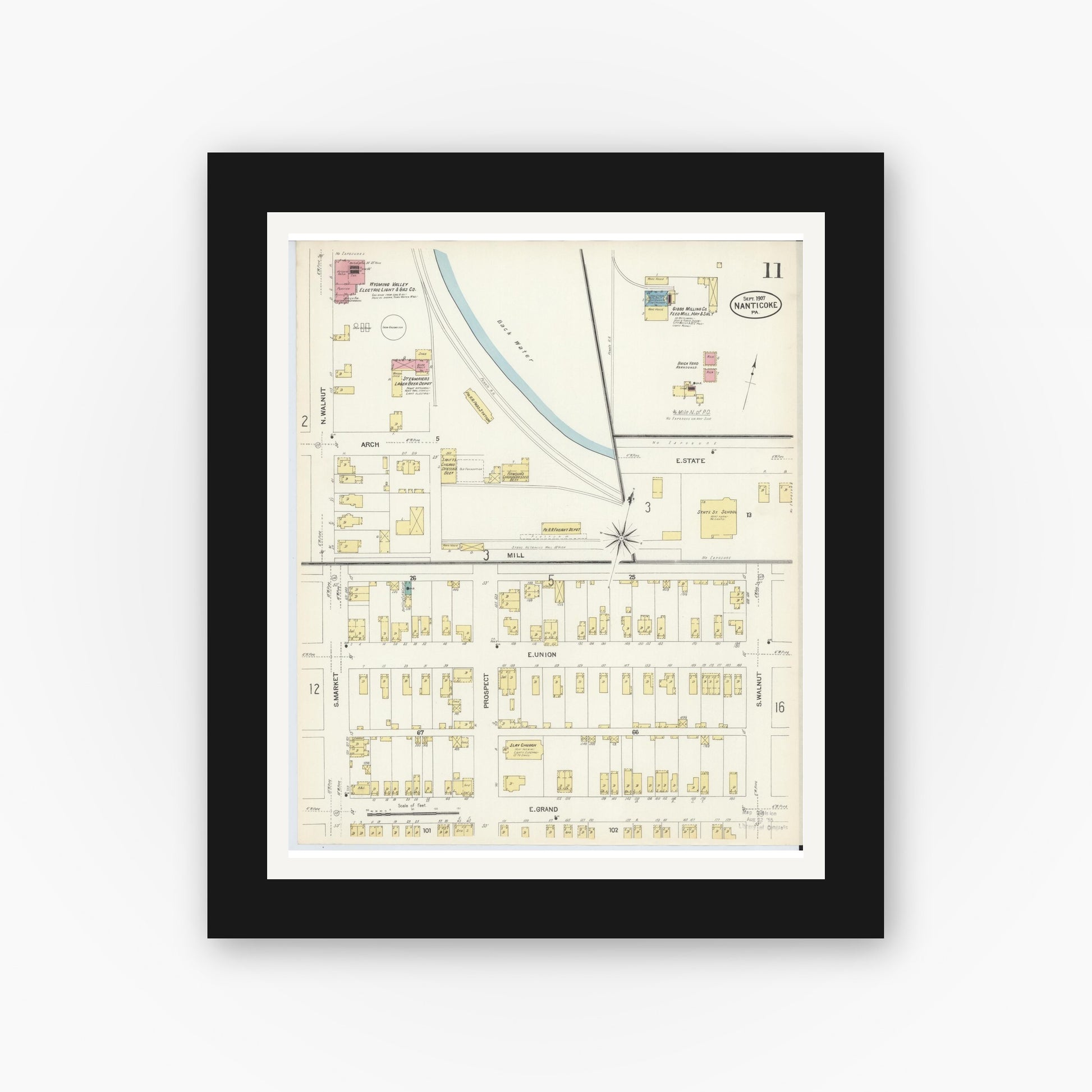 Old map wall art mockup — black gallery frame with white mat — Sanborn Fire Insurance Map from Nanticoke, Luzerne County, Pennsylvania (1907), Sheet #0011