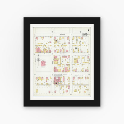 Old map wall art mockup — black gallery frame with white mat — Sanborn Fire Insurance Map from Highland, Madison County, Illinois (1899), Sheet #0002