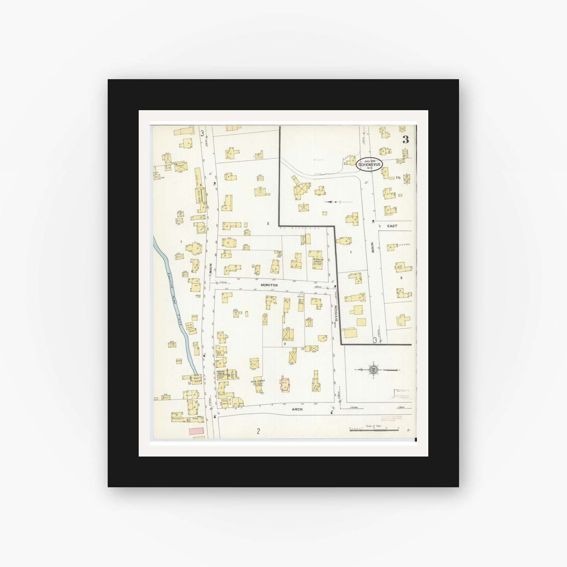 Old map wall art mockup — black gallery frame with white mat — Sanborn Fire Insurance Map from Schenevus, Otsego County, New York (1910), Sheet #0003