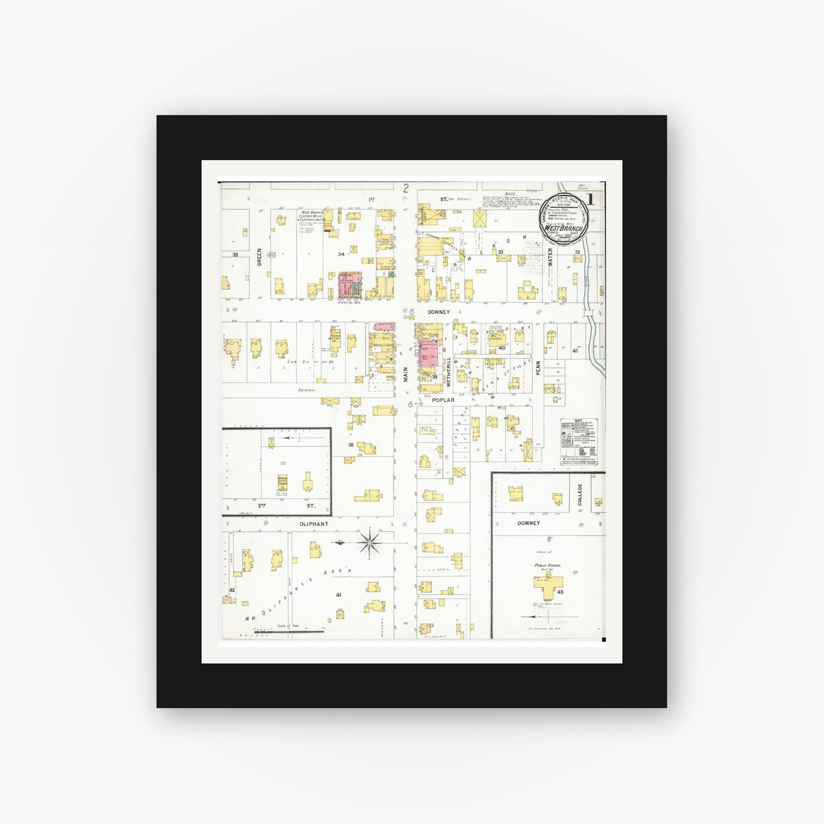 Old map wall art mockup — black gallery frame with white mat — Sanborn Fire Insurance Map from West Branch, Cedar County, Iowa (1900) â€” Complete Set