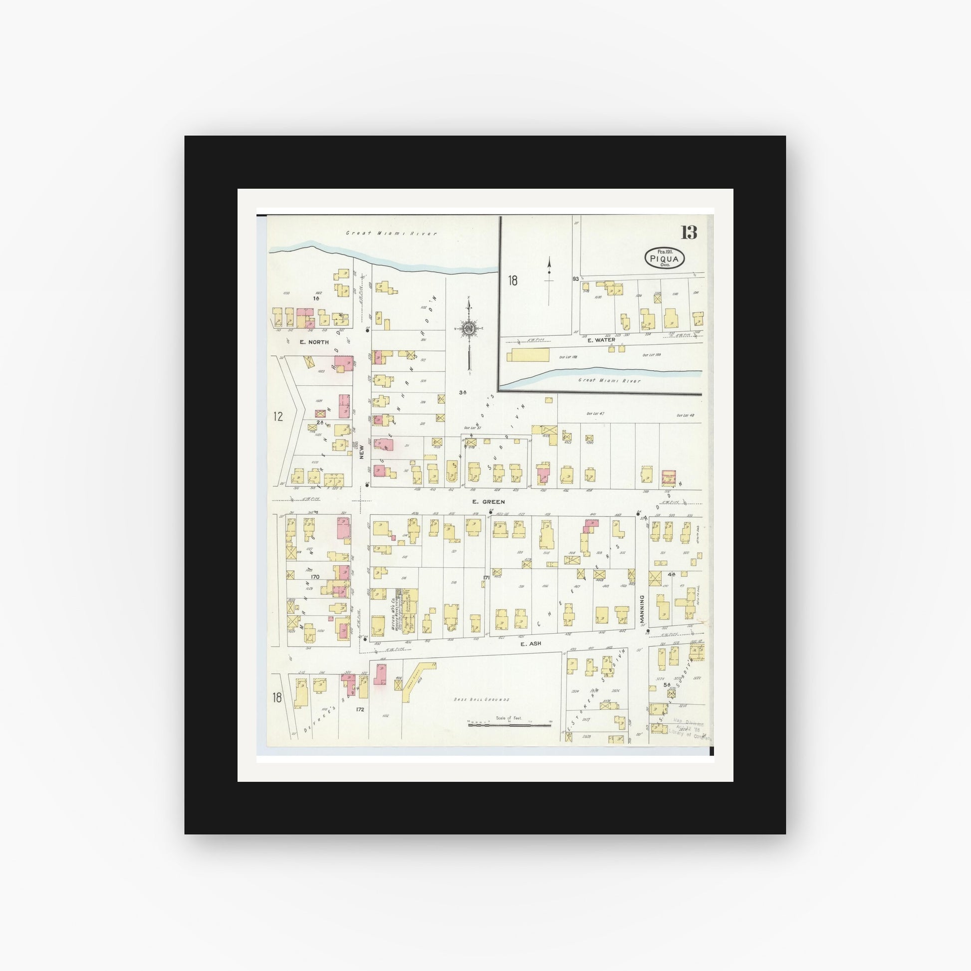 Old map wall art mockup — black gallery frame with white mat — Sanborn Fire Insurance Map from Piqua, Miami County, Ohio (1911), Sheet #0013