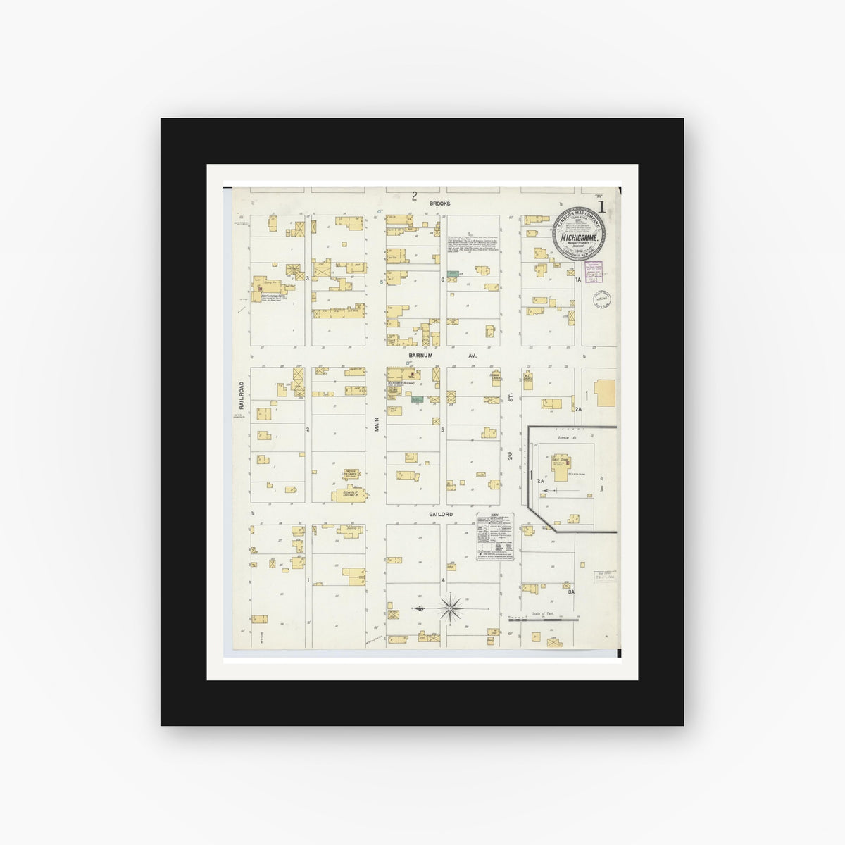 Old map wall art mockup — black gallery frame with white mat — Sanborn Fire Insurance Map from Michigamme, Marquette County, Michigan (1902), Sheet #0001