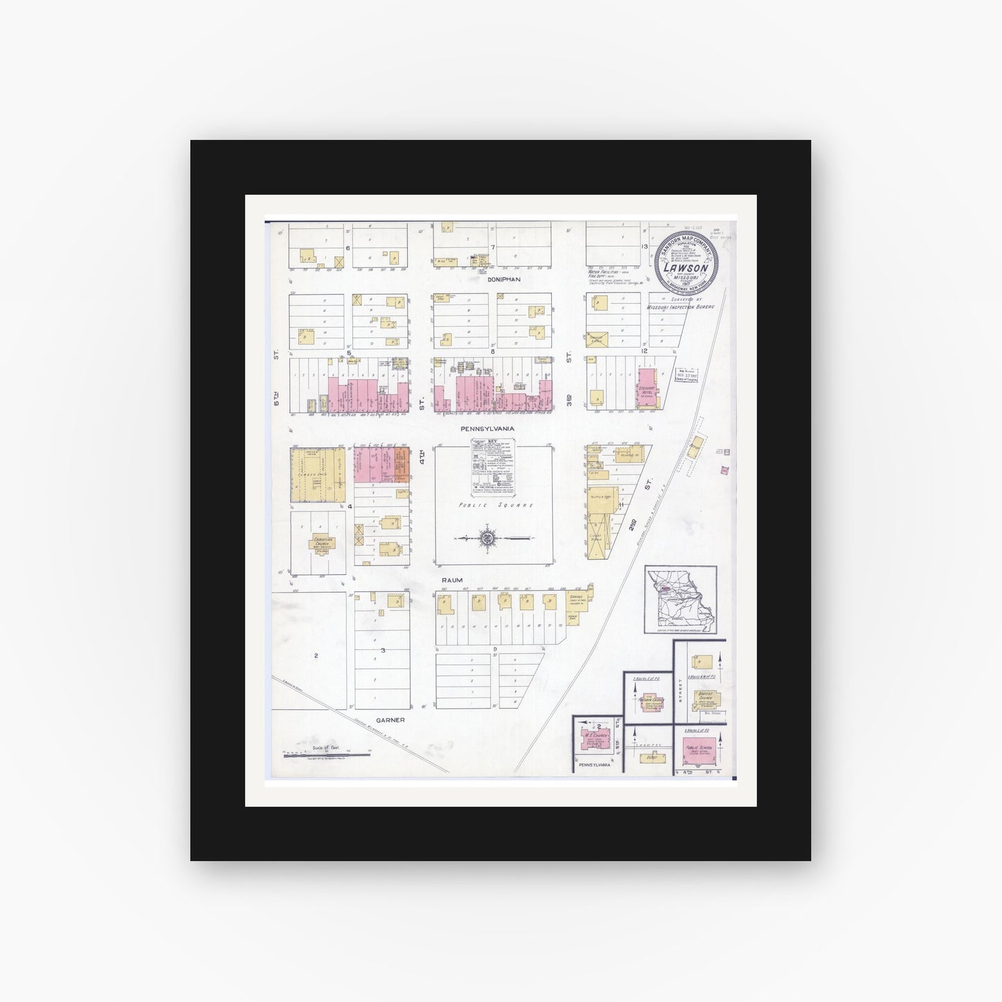 Old map wall art mockup — black gallery frame with white mat — Sanborn Fire Insurance Map from Lawson, Ray County, Missouri (1917), Sheet #0001