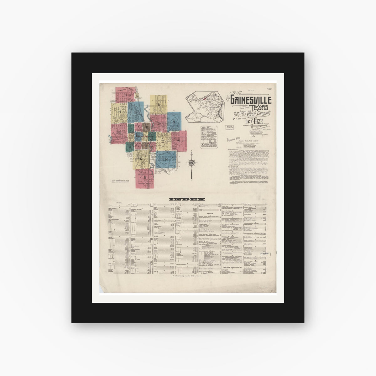 Old map wall art mockup — black gallery frame with white mat — Sanborn Fire Insurance Map from Gainesville, Cooke County, Texas (1922) - Complete Map Set