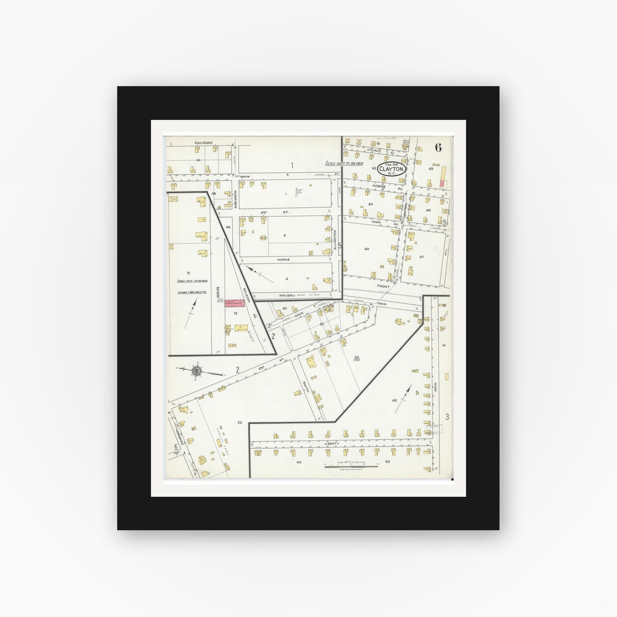 Old map wall art mockup — black gallery frame with white mat — Sanborn Fire Insurance Map from Clayton, Johnston County, North Carolina (1918), Sheet #0006