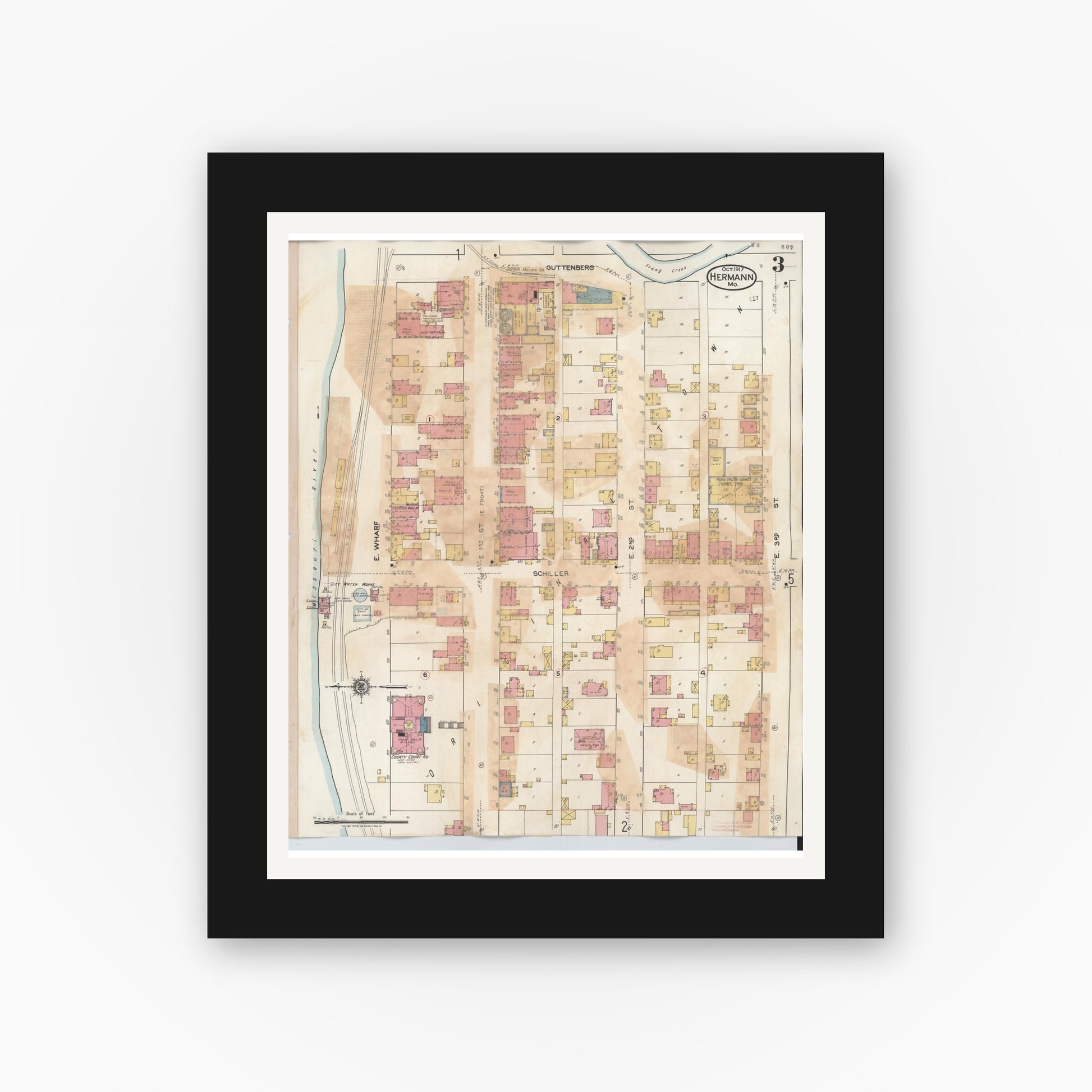 Old map wall art mockup — black gallery frame with white mat — Sanborn Fire Insurance Map from Hermann, Gasconade County, Missouri (1932), Sheet #0003