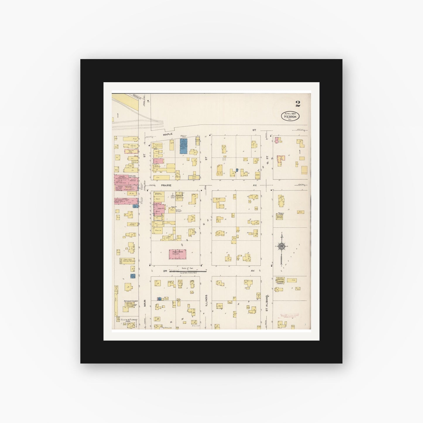 Old map wall art mockup — black gallery frame with white mat — Sanborn Fire Insurance Map from Hebron, McHenry County, Illinois (1922), Sheet #0002