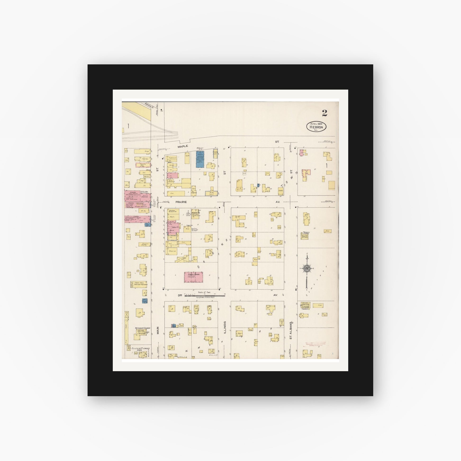 Old map wall art mockup — black gallery frame with white mat — Sanborn Fire Insurance Map from Hebron, McHenry County, Illinois (1922), Sheet #0002