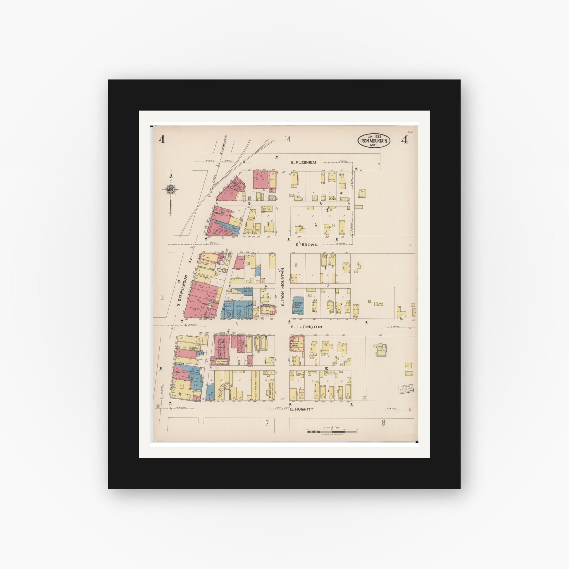 Old map wall art mockup — black gallery frame with white mat — Sanborn Fire Insurance Map from Iron Mountain, Dickinson County, Michigan (1923), Sheet #0004