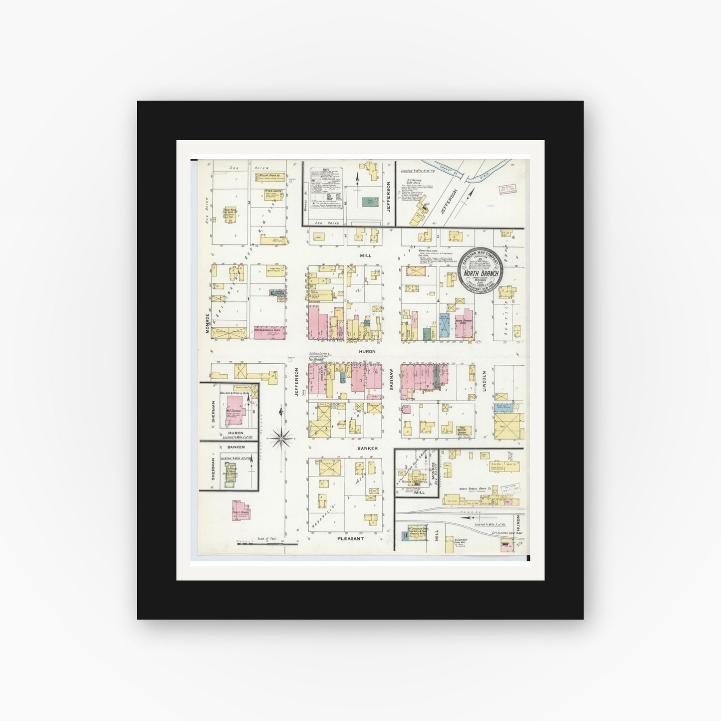 Old map wall art mockup — black gallery frame with white mat — Sanborn Fire Insurance Map from North Branch, Lapeer County, Michigan (1909), Sheet #0001