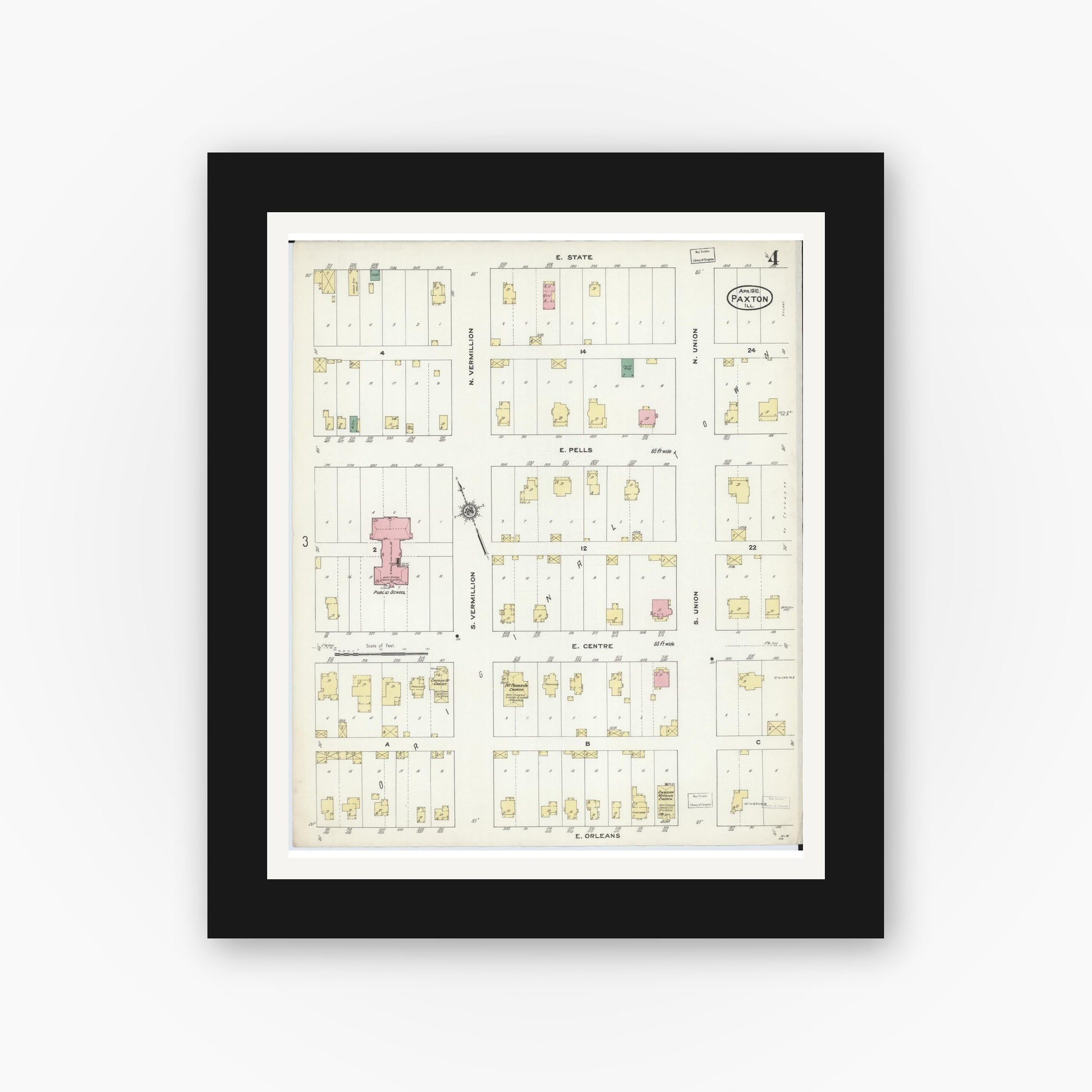 Old map wall art mockup — black gallery frame with white mat — Sanborn Fire Insurance Map from Paxton, Ford County, Illinois (1910), Sheet #0004
