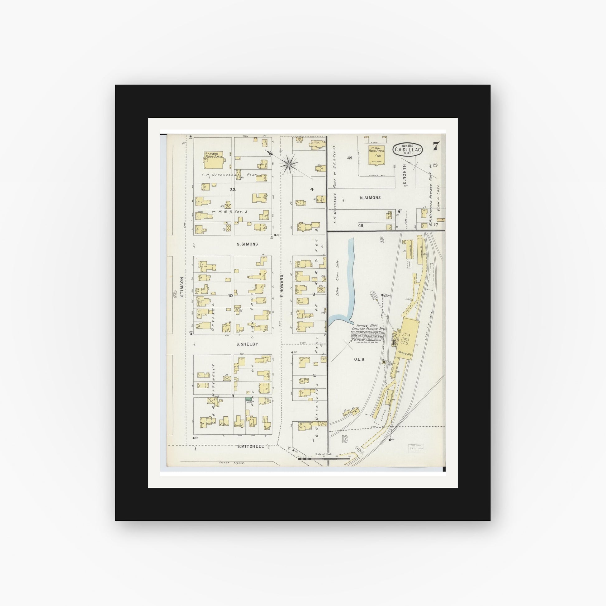 Old map wall art mockup — black gallery frame with white mat — Sanborn Fire Insurance Map from Cadillac, Wexford County, Michigan (1895), Sheet #0007